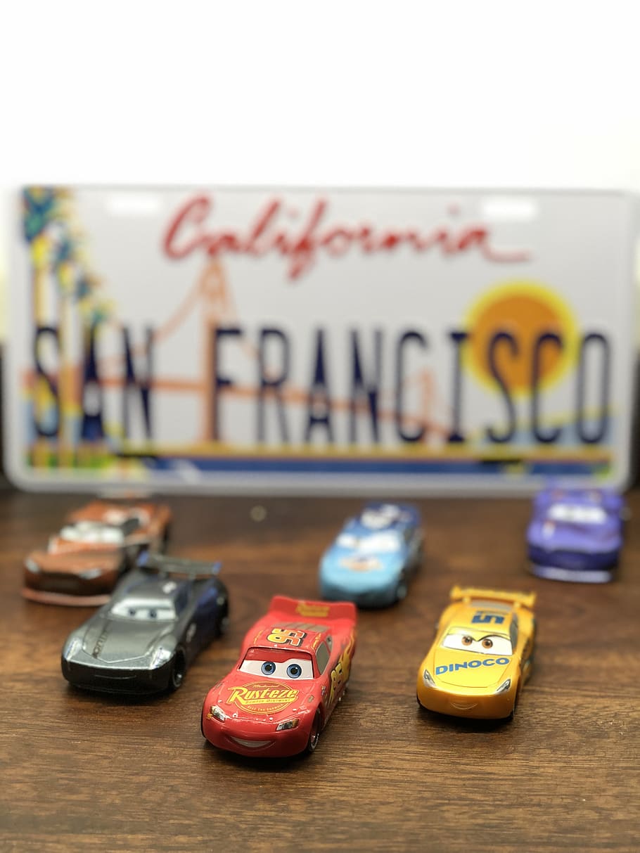 910x1213 HD wallpaper: cars, figurines, race