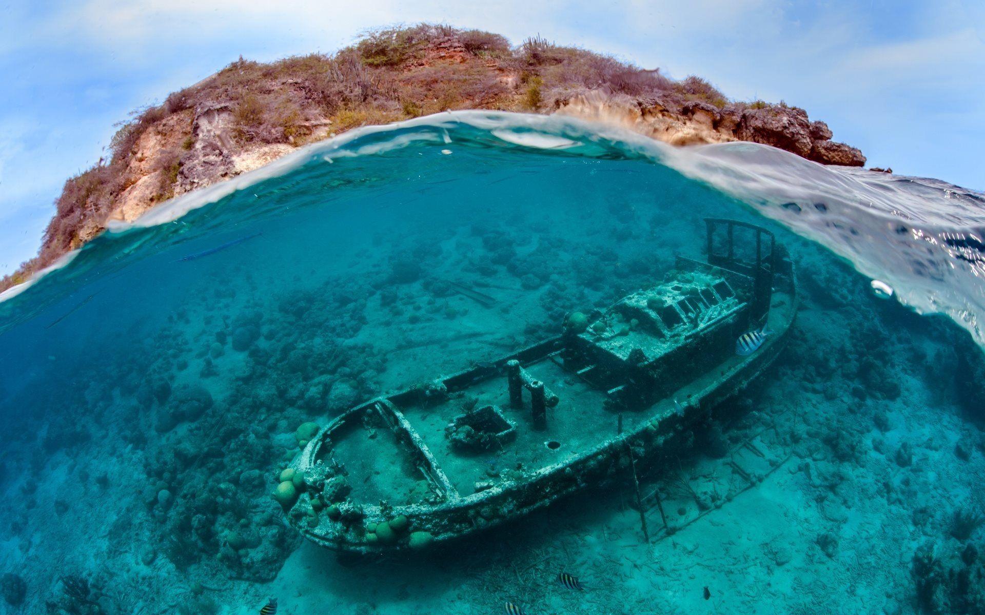 1920x1200 Download wallpaper underwater, sinking ship, sea, island