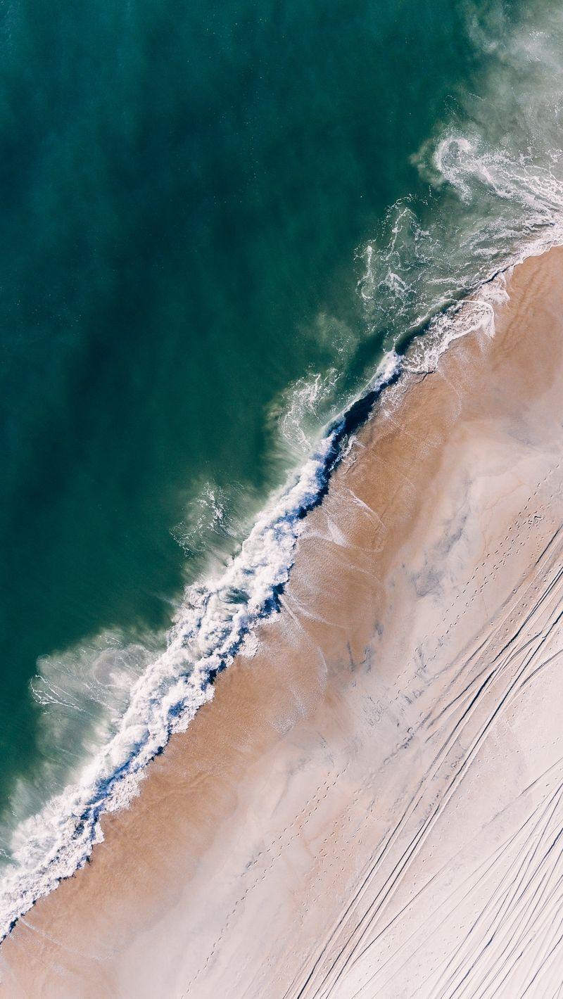 800x1420 Download wallpaper 800x1420 ocean, aerial view, surf, sand