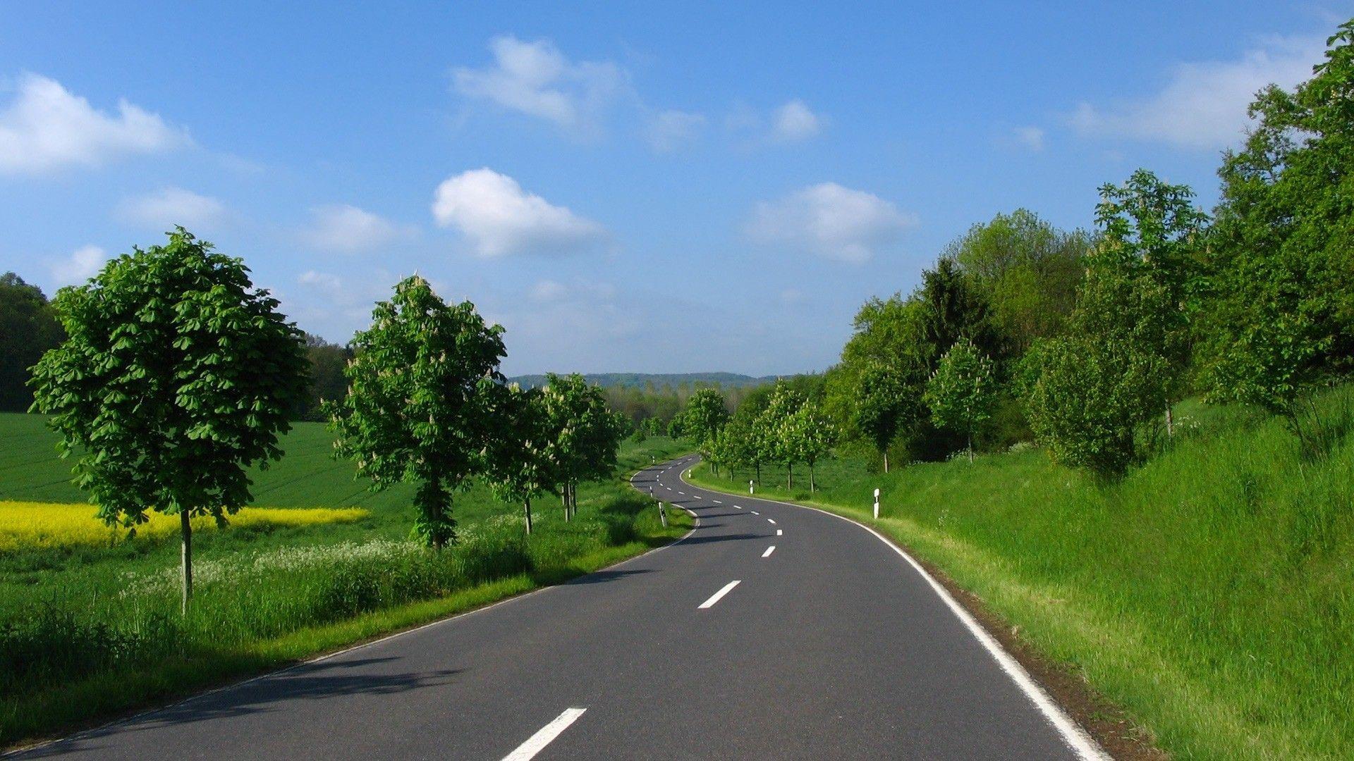 1920x1080 Smooth road among fields in Ukraine wallpaper and image