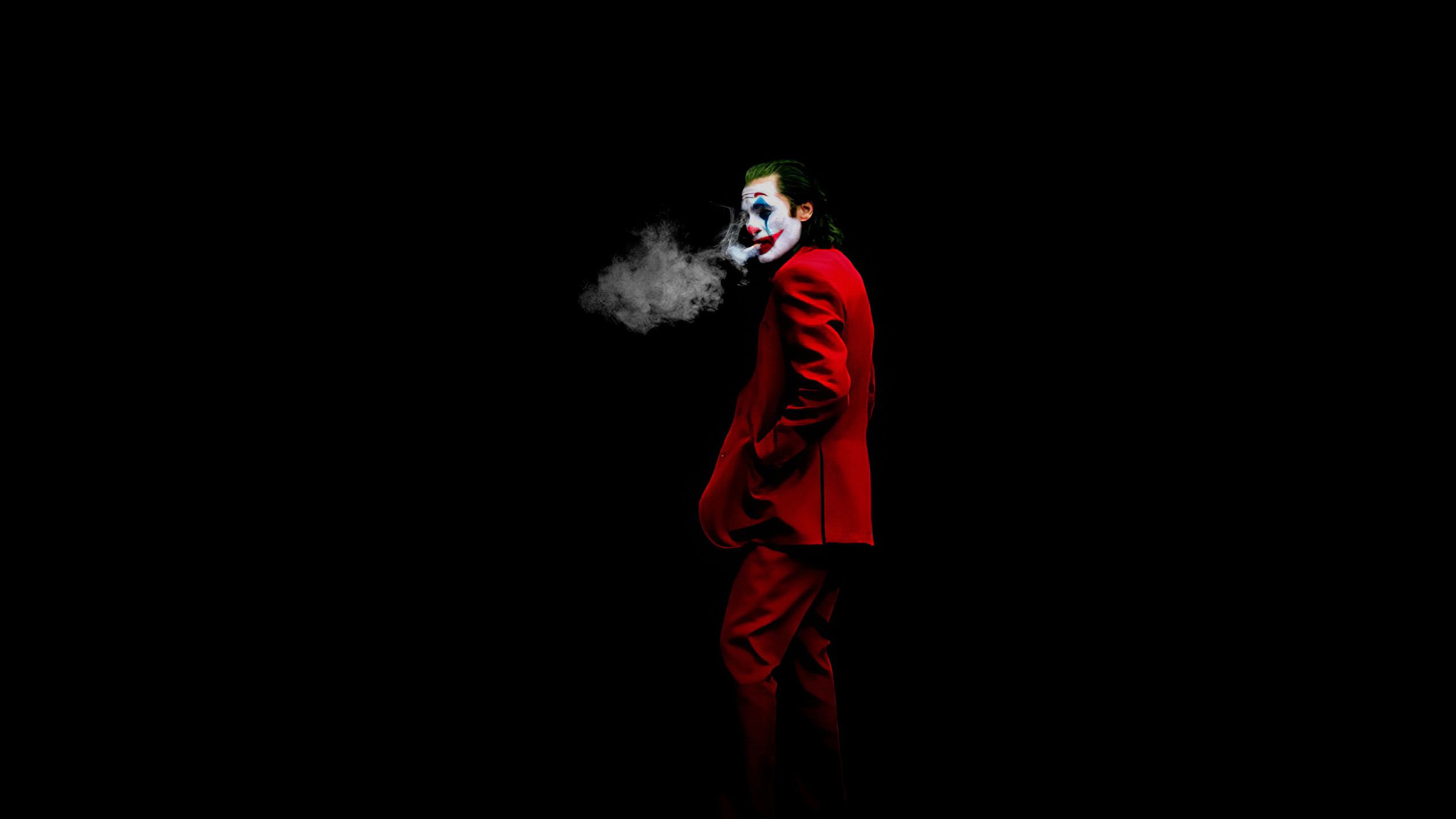 2560x1440 Joker Is Wearing Red Dress Standing