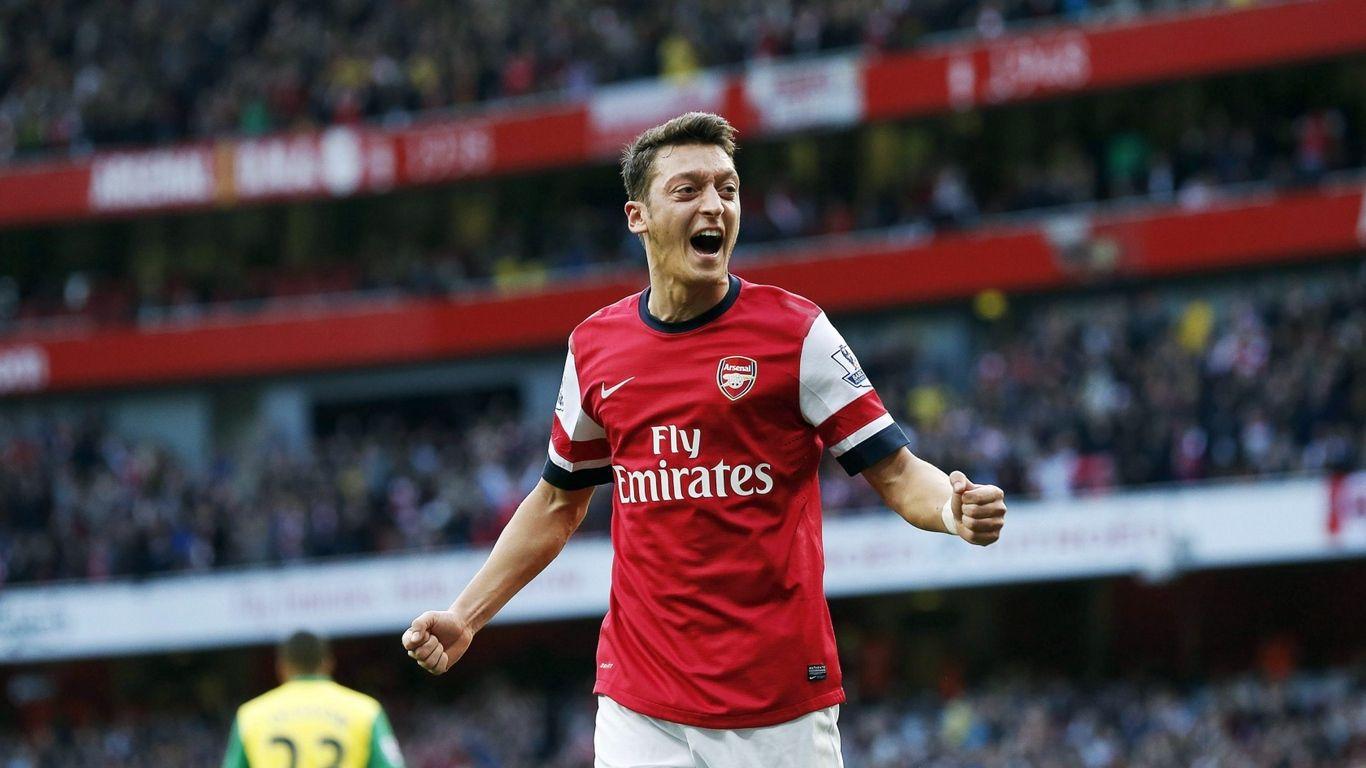 1366x768 Download wallpaper 1366x768 mesut ozil, arsenal, germany
