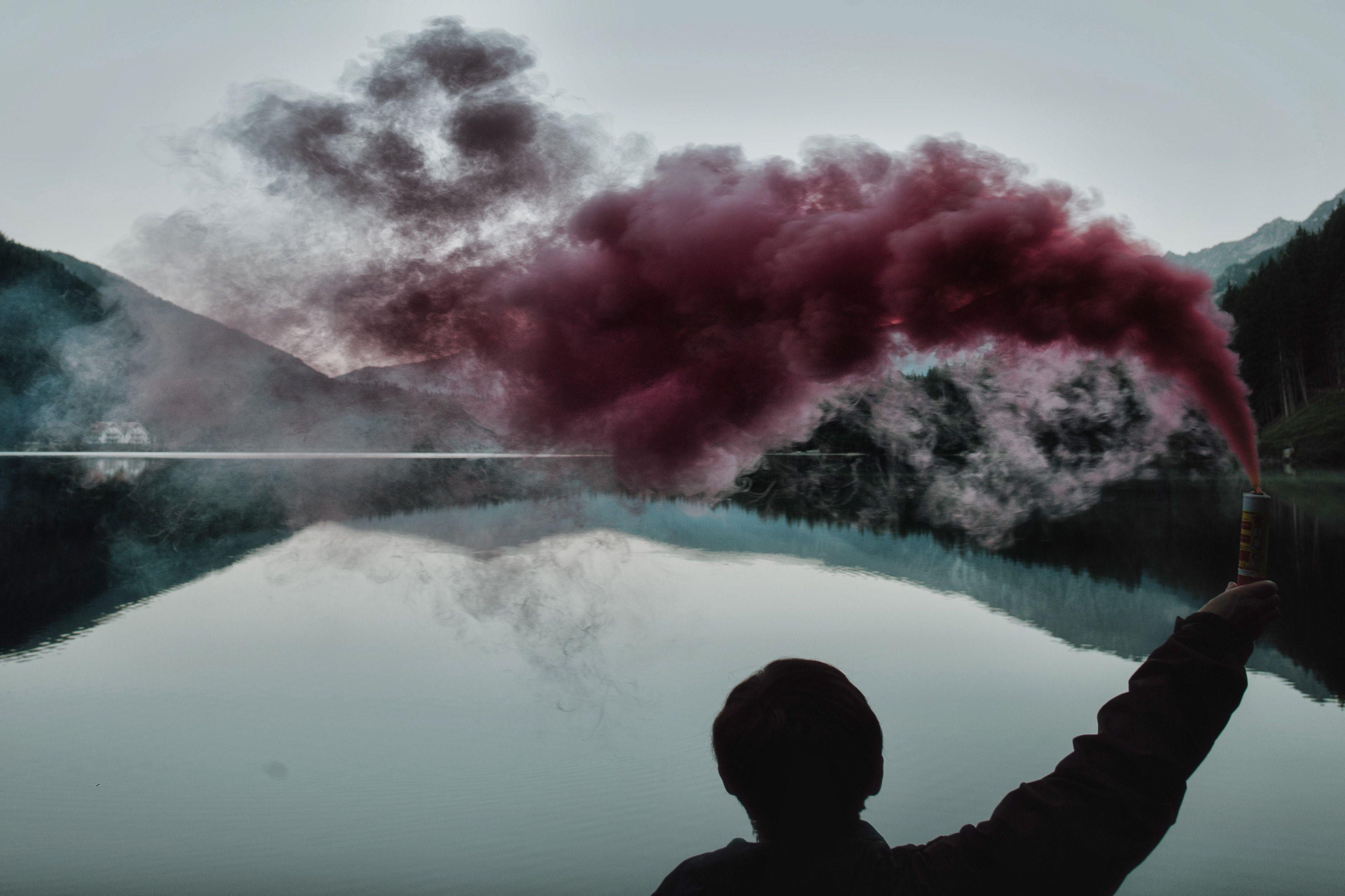 3648x2432 Person Holding Smoke Bomb · Free