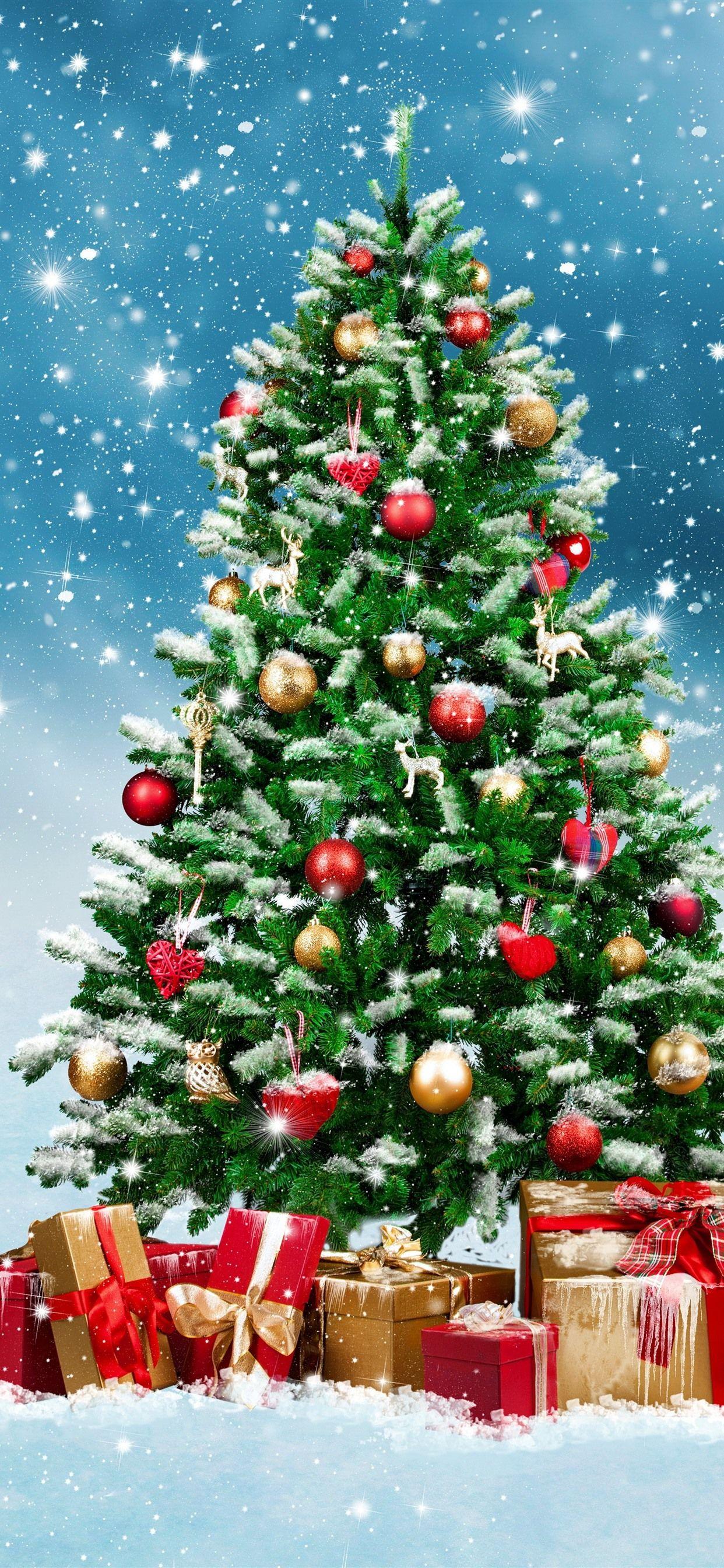 1242x2688 Christmas tree, gifts, balls, snowflakes, snow, shine