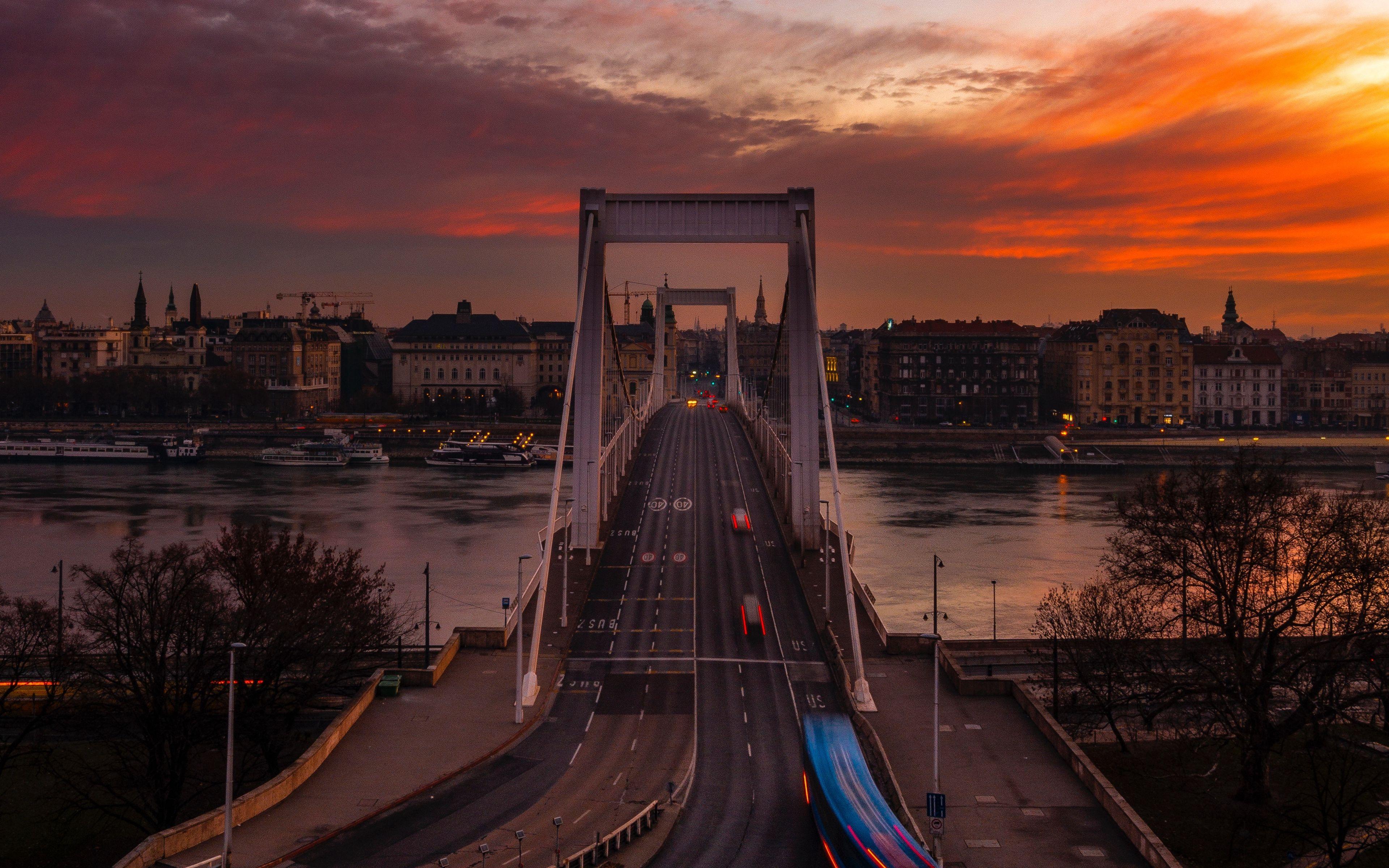 3840x2400 Download wallpaper 3840x2400 bridge, sunset, city, budapest