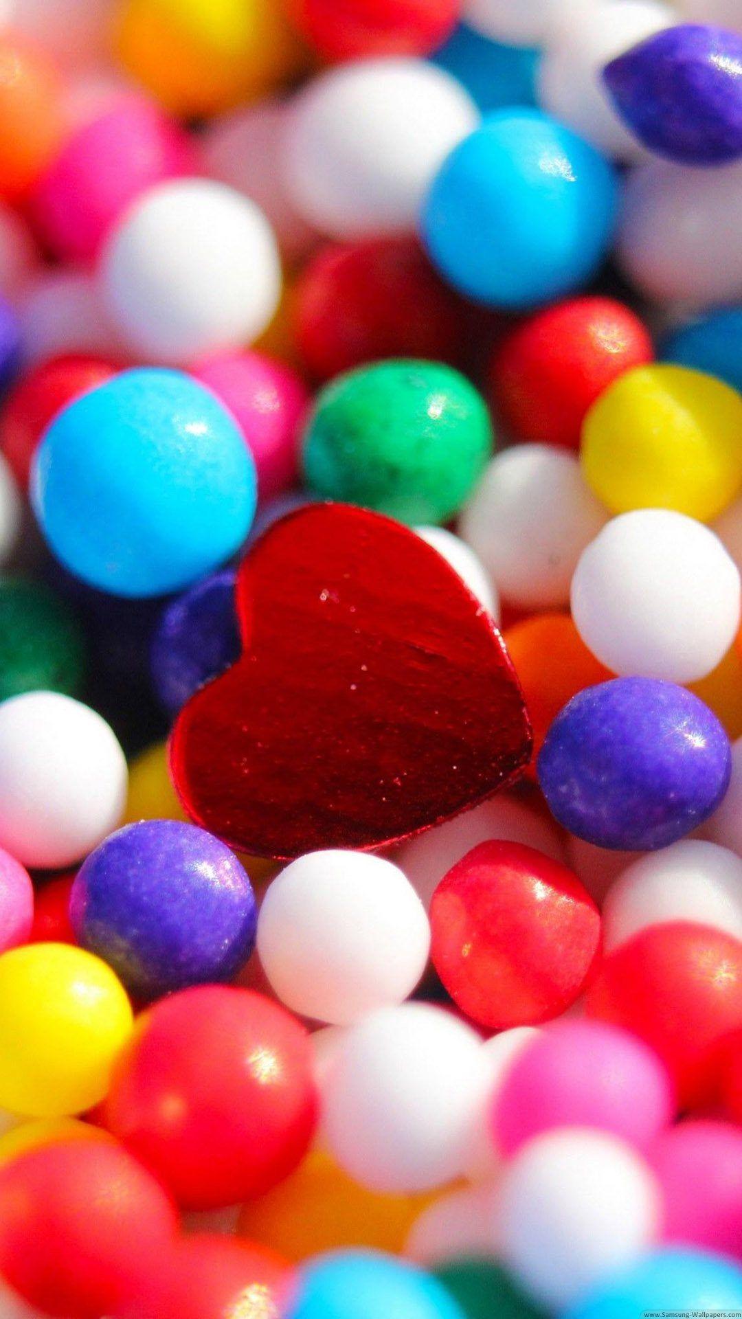 1080x1920 Colorful Marbles With Red Heart Wallpaper for iPhone