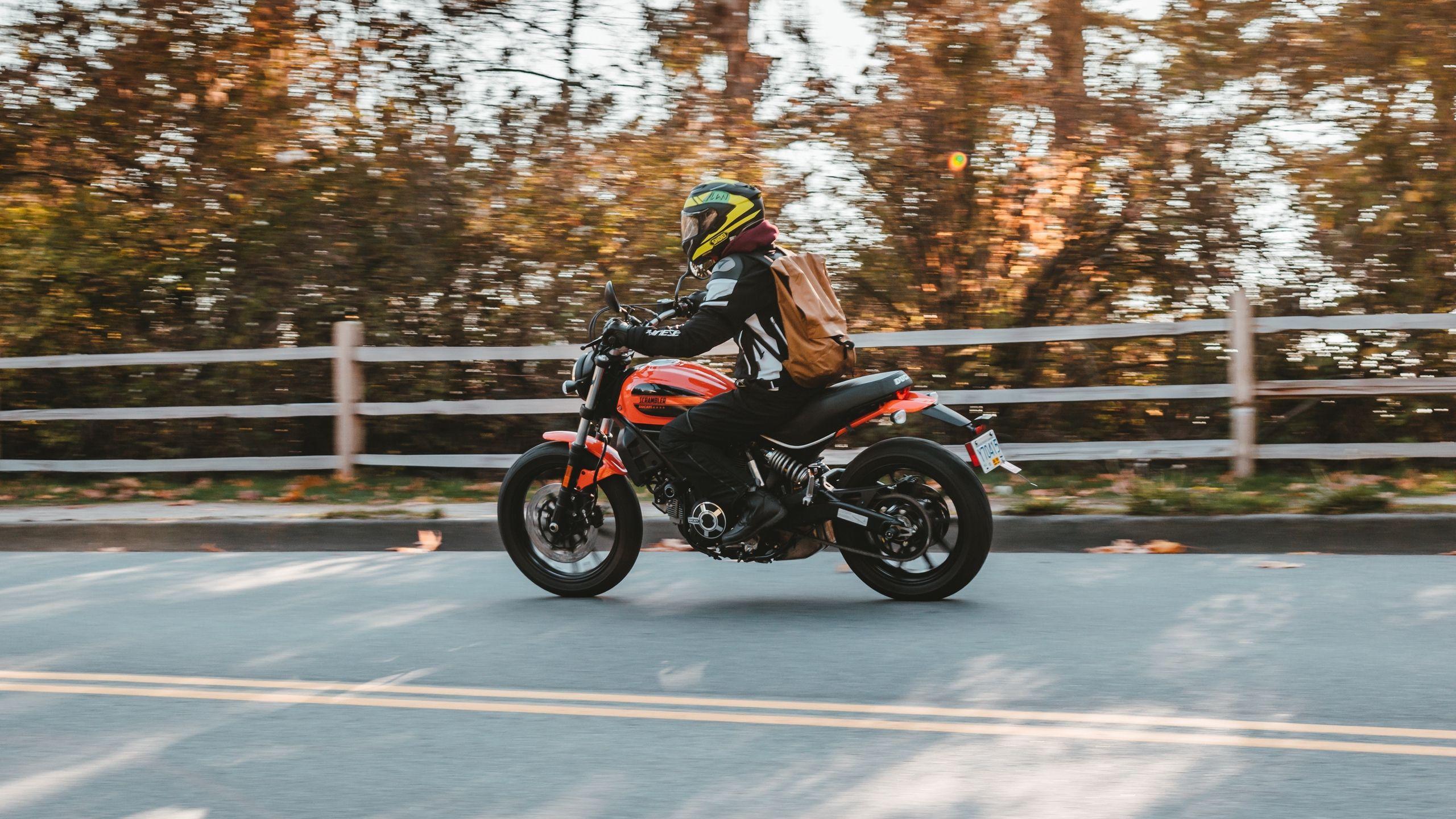 2560x1440 Download wallpaper 2560x1440 motorcycle, bike, biker, road