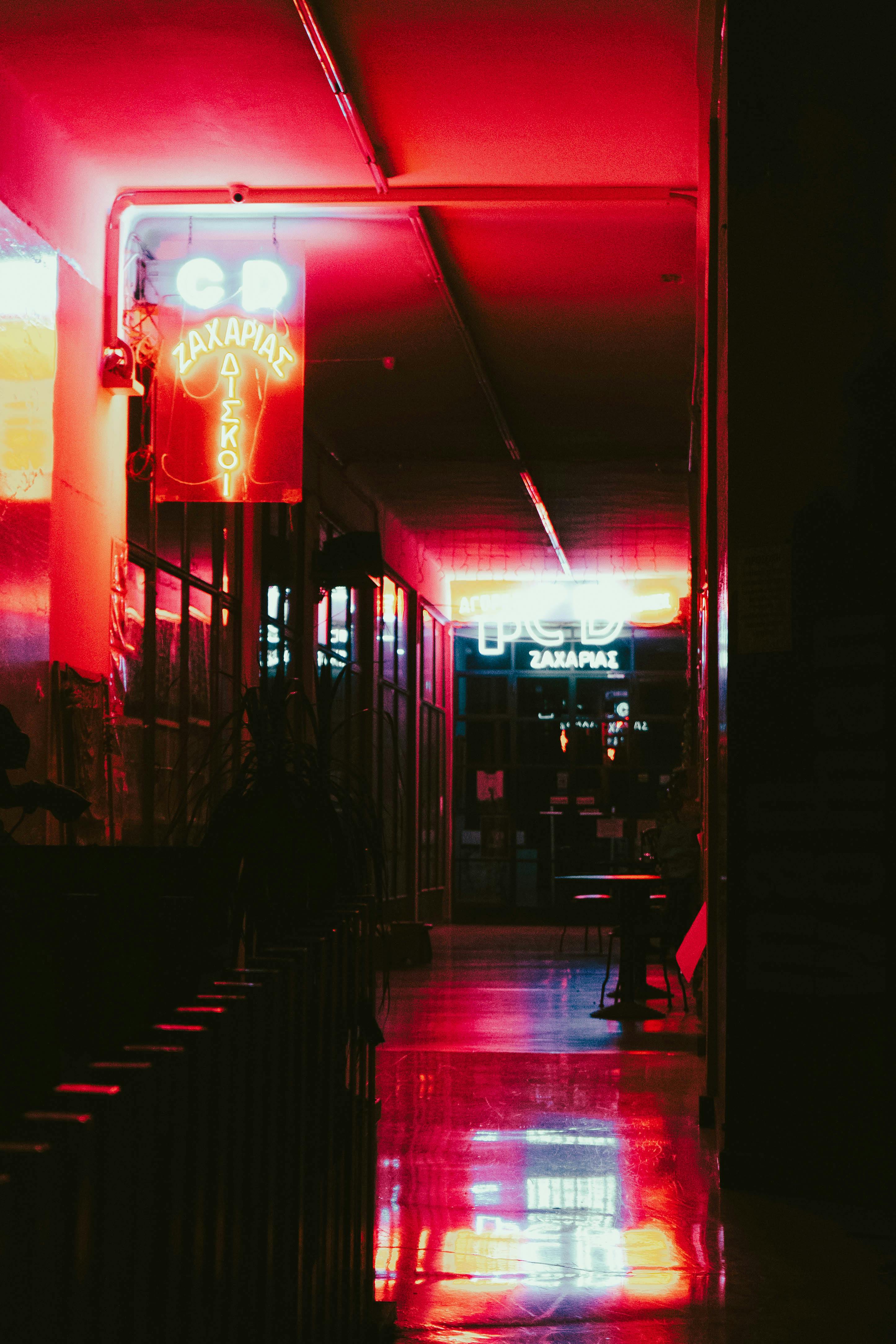 2891x4336 Bar Illuminated with Red Neon Lights