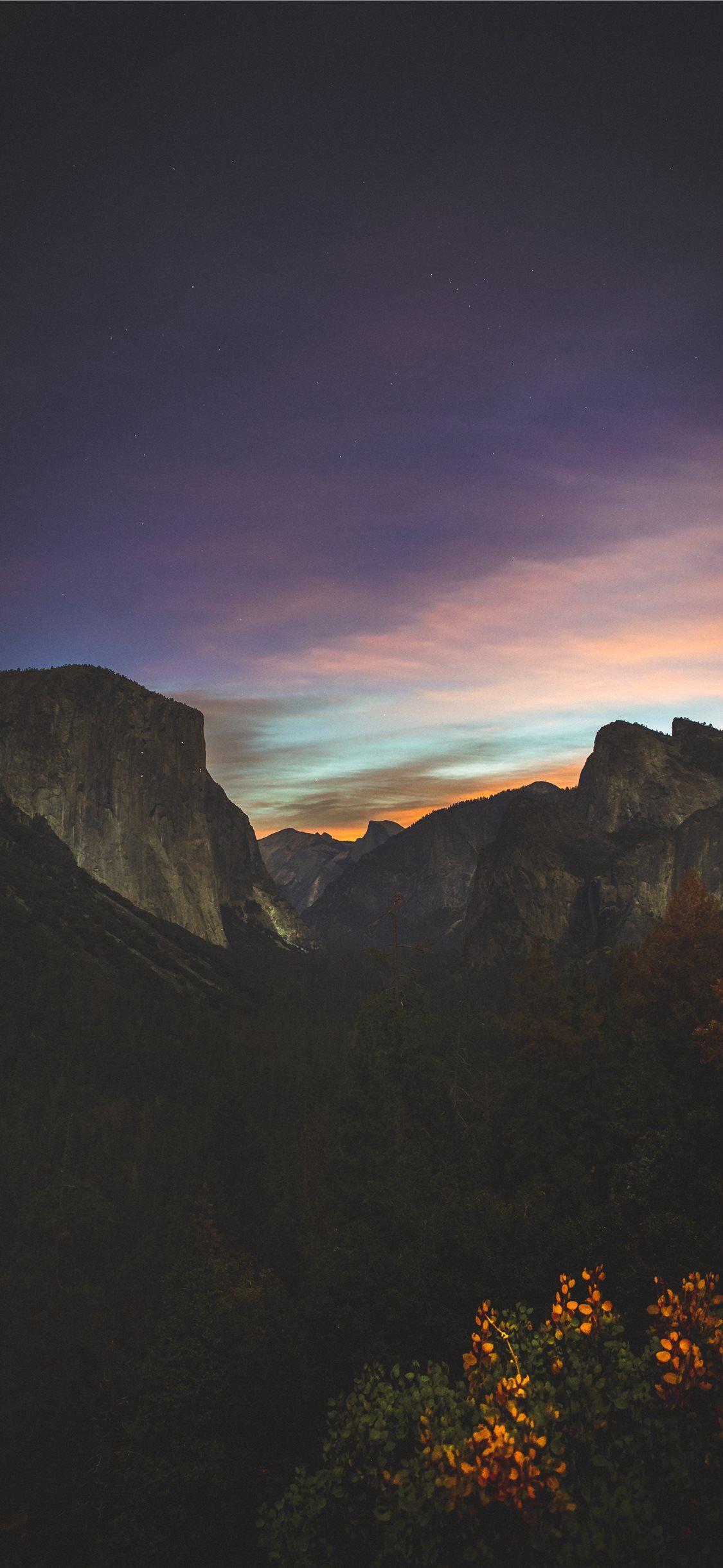 1125x2436 tall mountain in night sky iPhone 11 Wallpaper Free Download