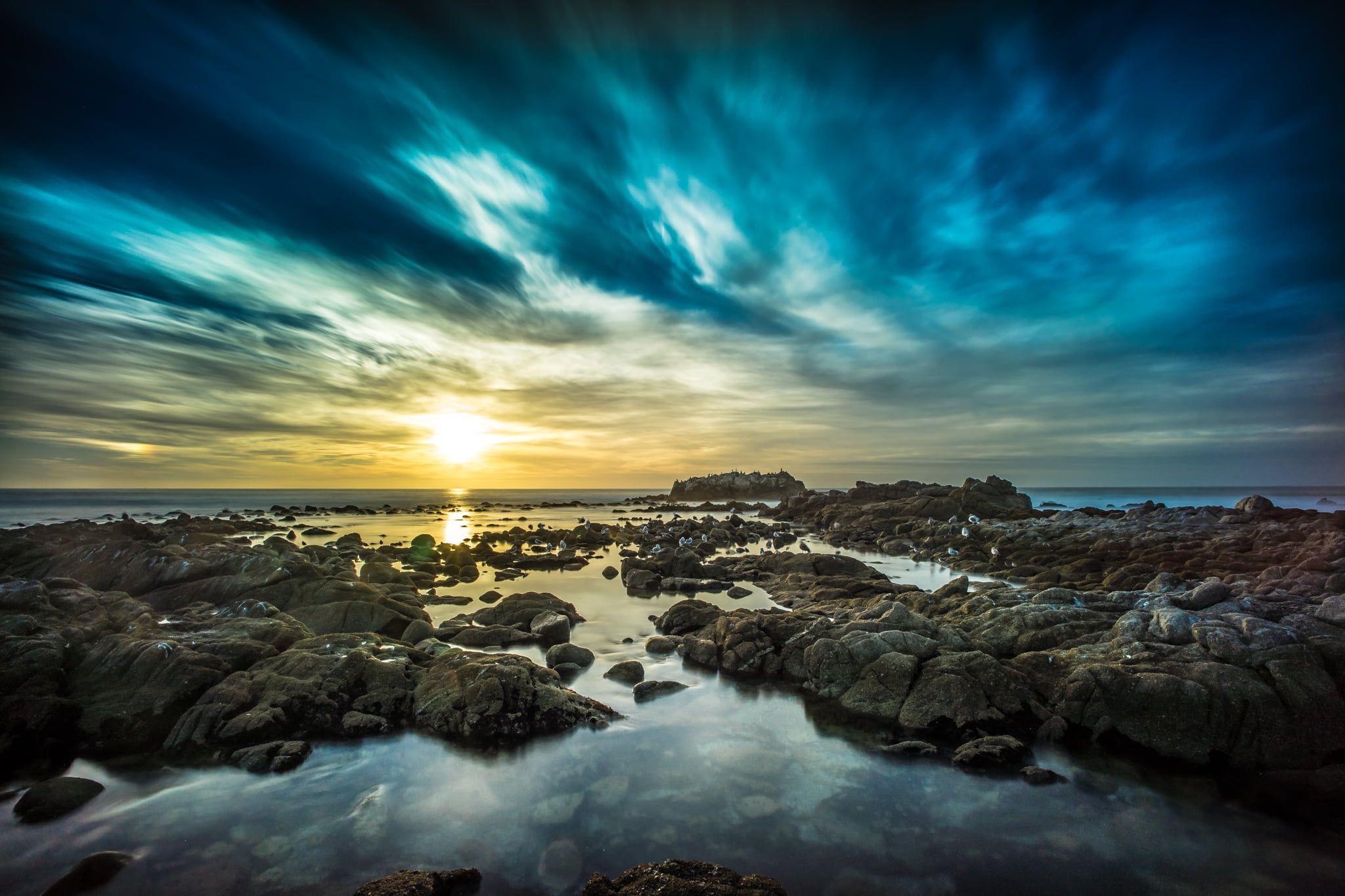 2048x1365 Rock formation on body of water under blue sky, sunset drive, monterey, california HD wallpaper