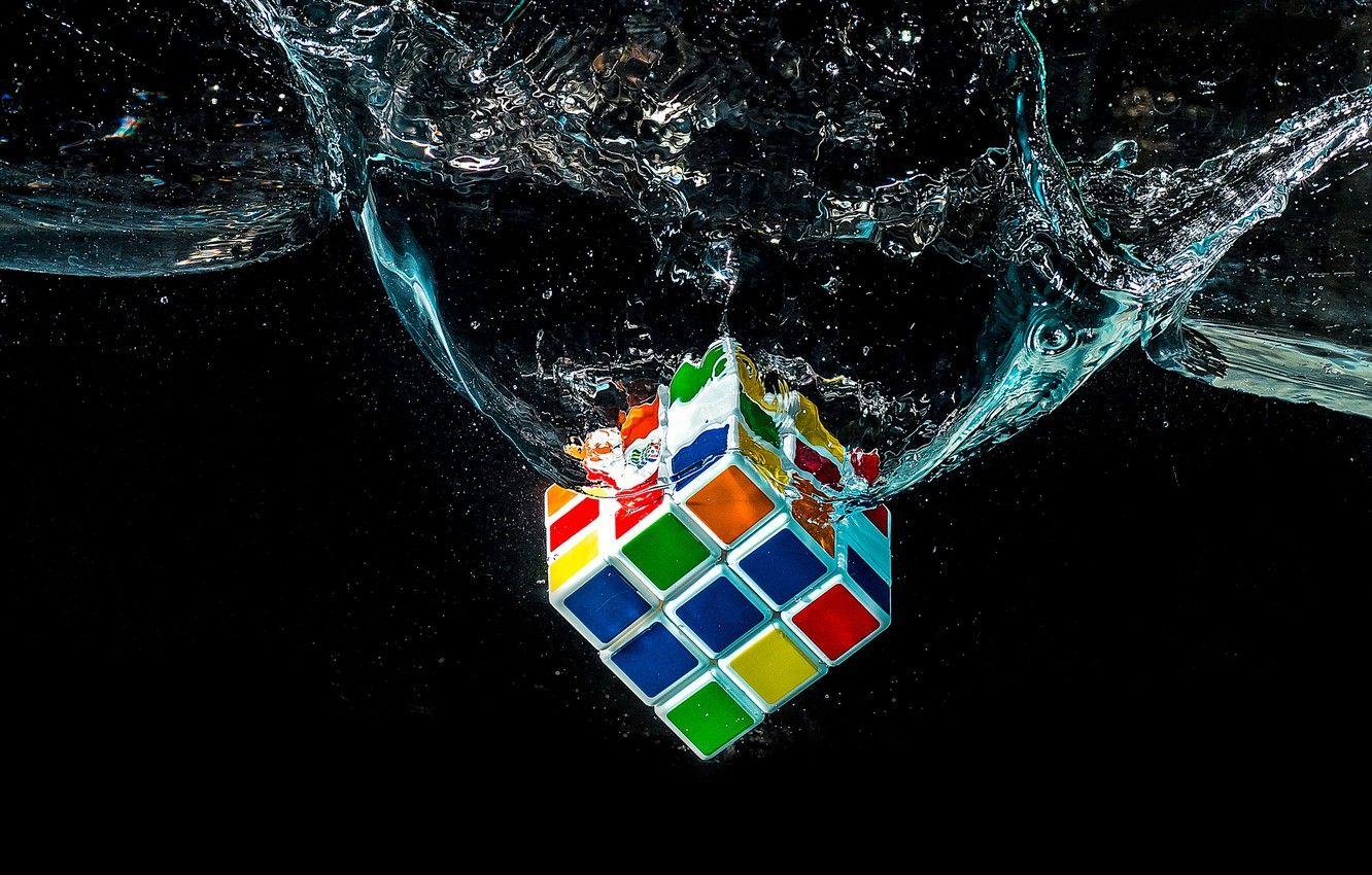 1332x850 Wallpaper water, macro, Rubik's cube, puzzle image