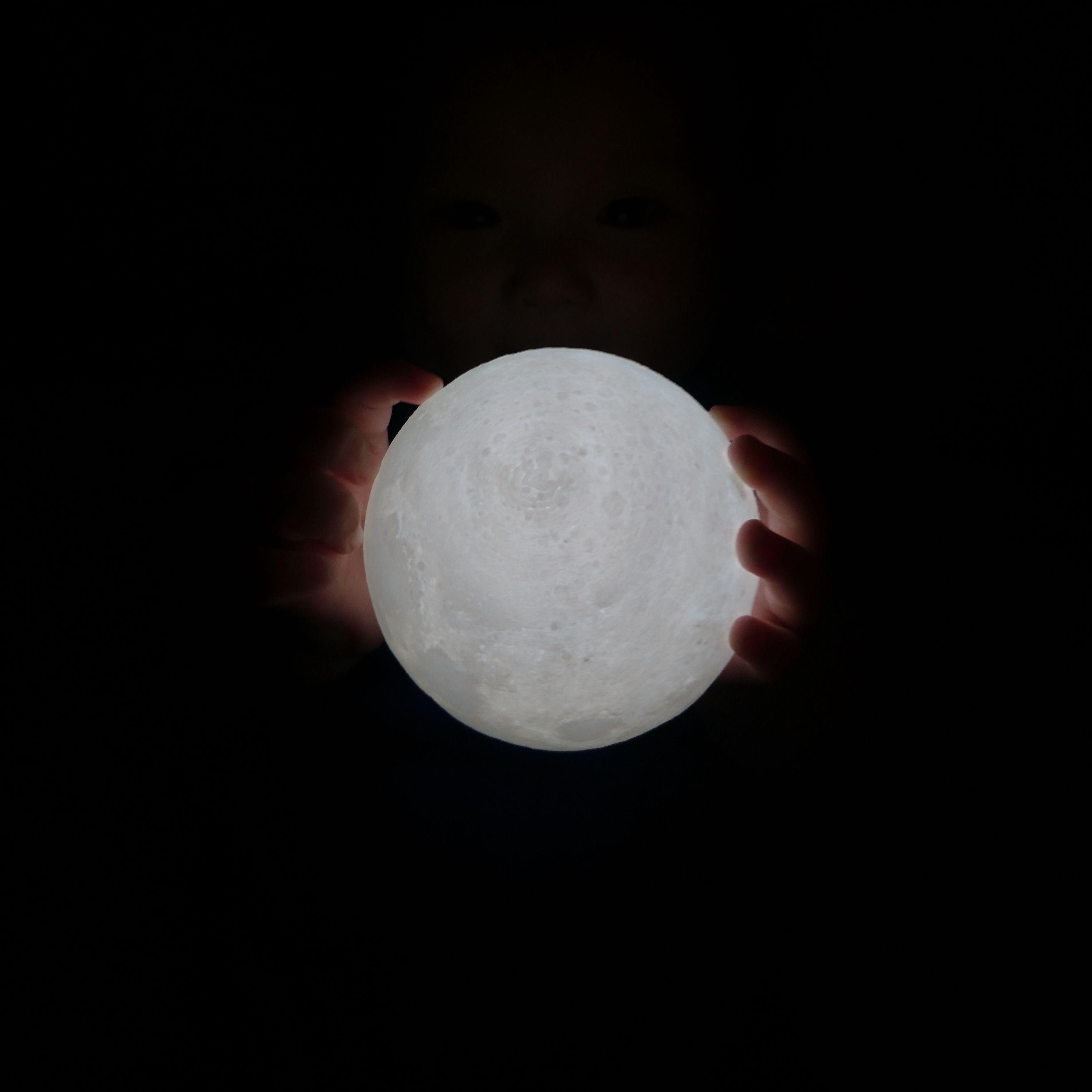 3415x3415 Download wallpaper 3415x3415 ball, glow, hands, child, dark