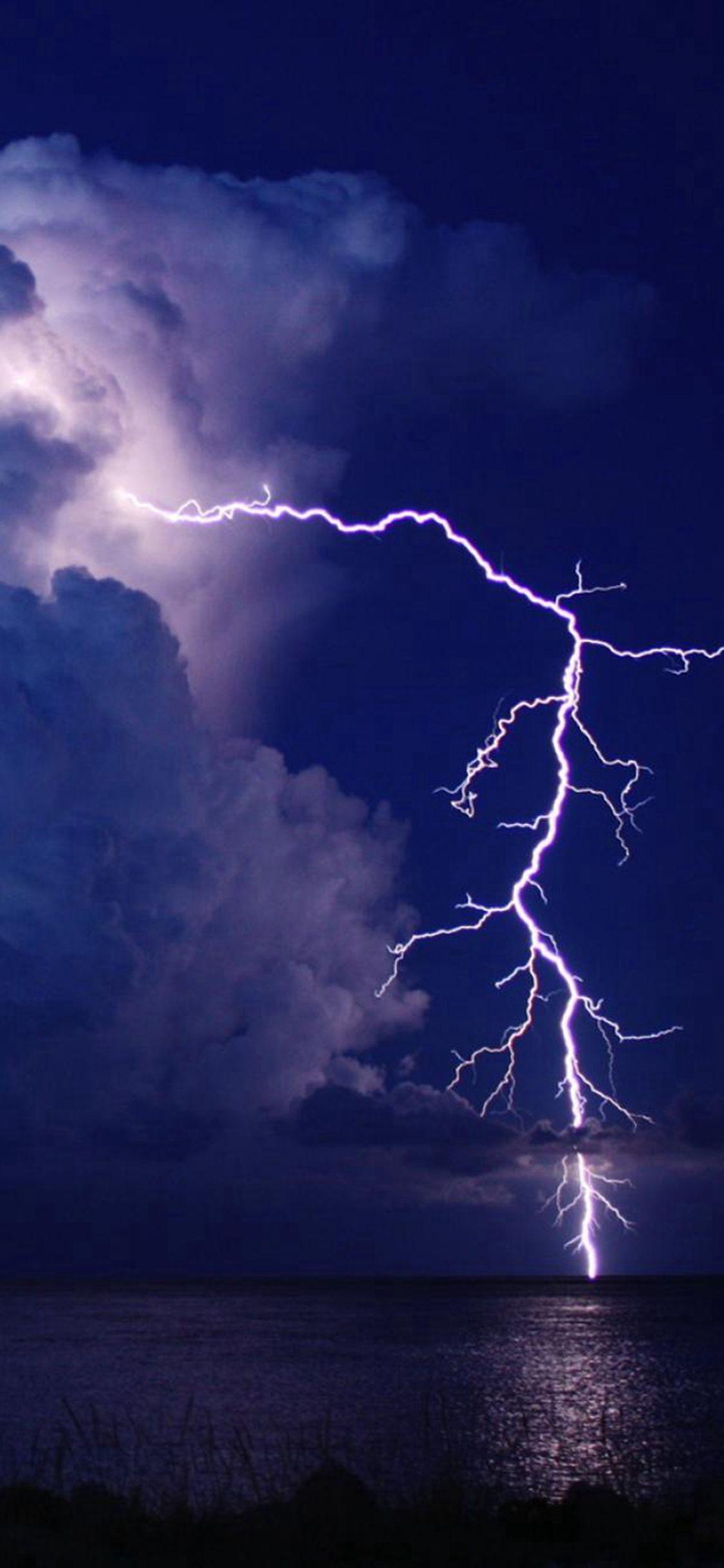 1125x2436 Storm Lightning Over Lake Night Sky View iPhone Wallpaper Free