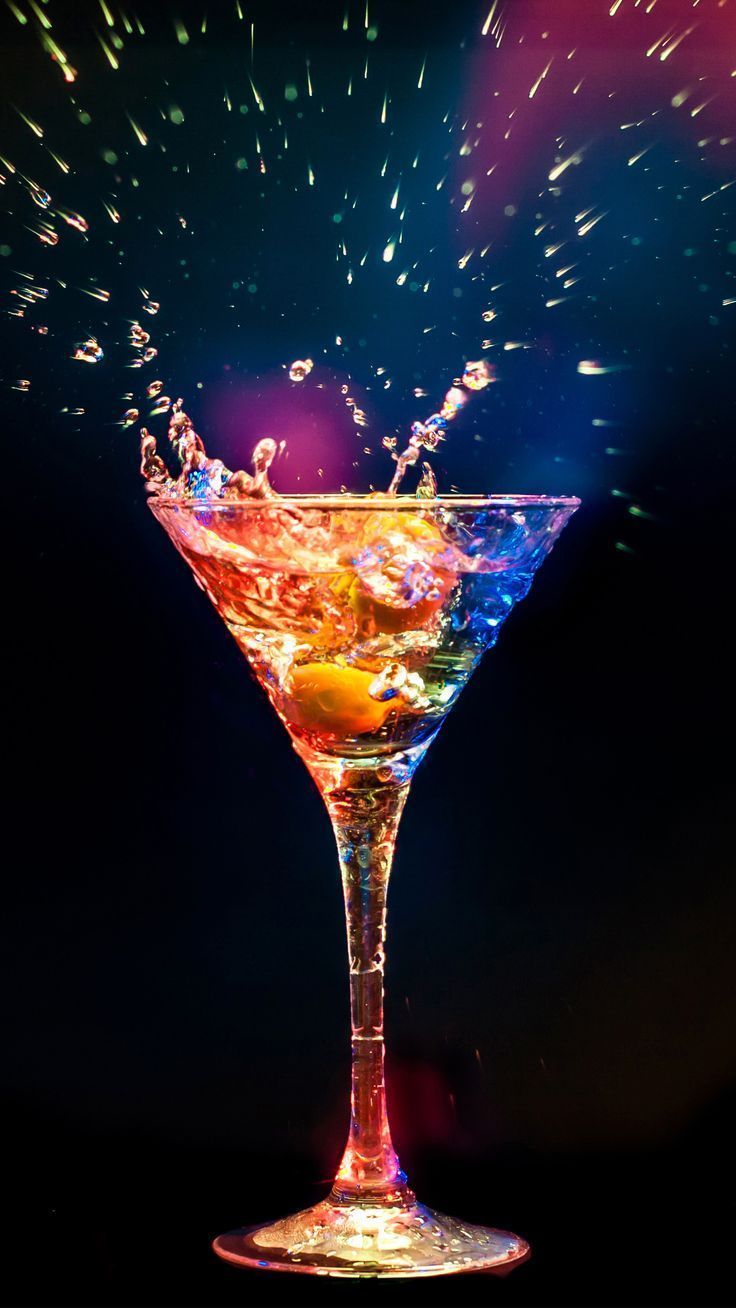 736x1308 Colorful Drink Splashing into Glass