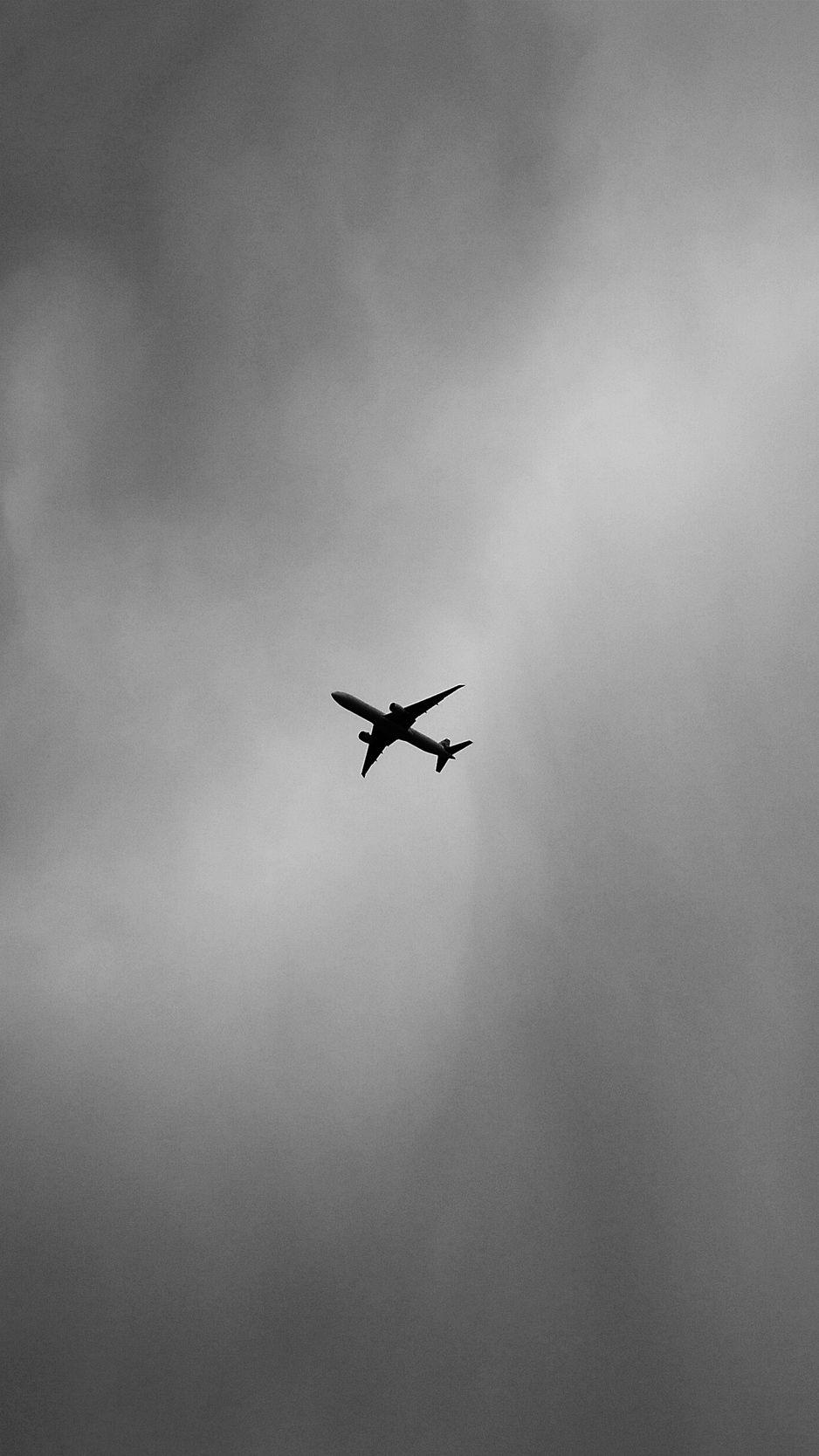 938x1668 Download wallpaper 938x1668 airplane, bw, minimalism, flight