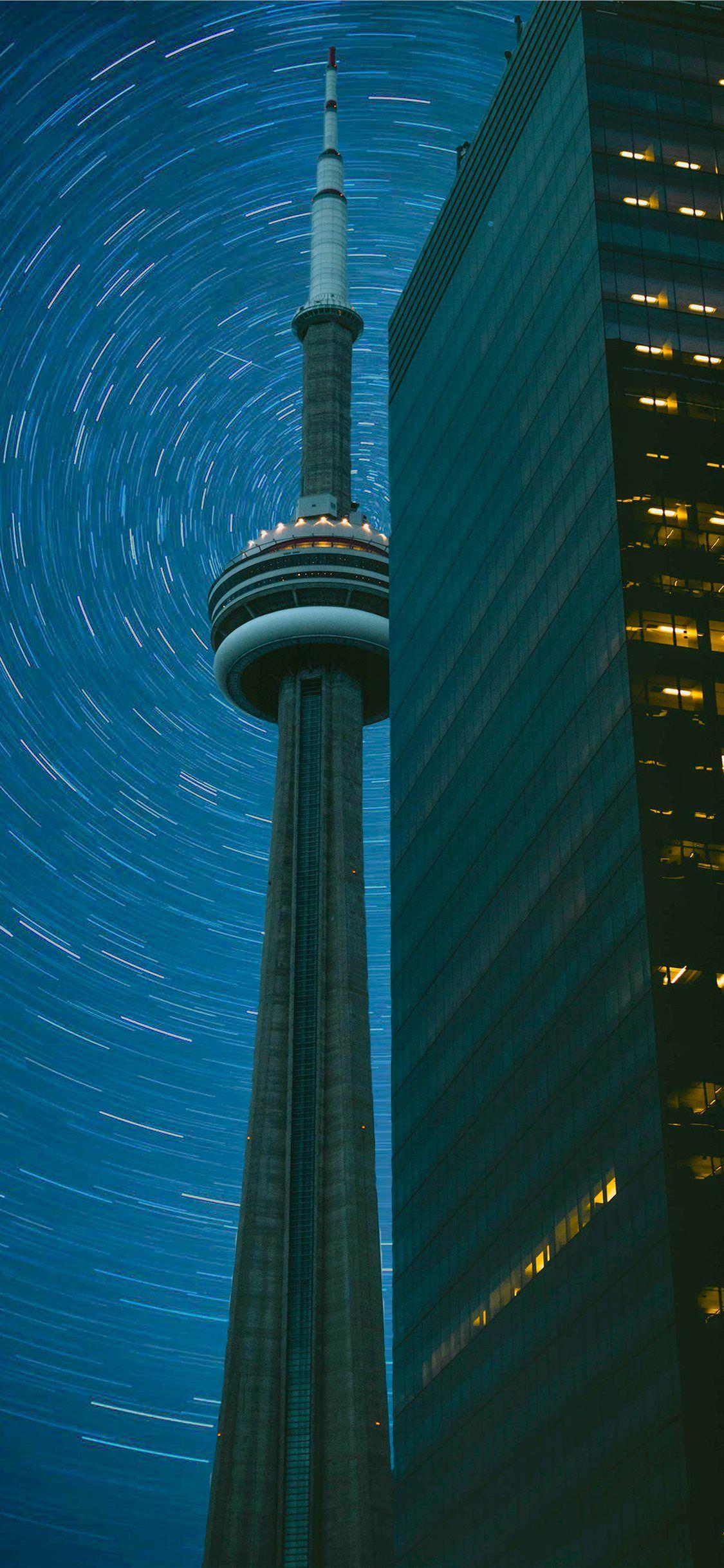 1125x2436 CN Tower in time lapse photography iPhone X Wallpaper Free