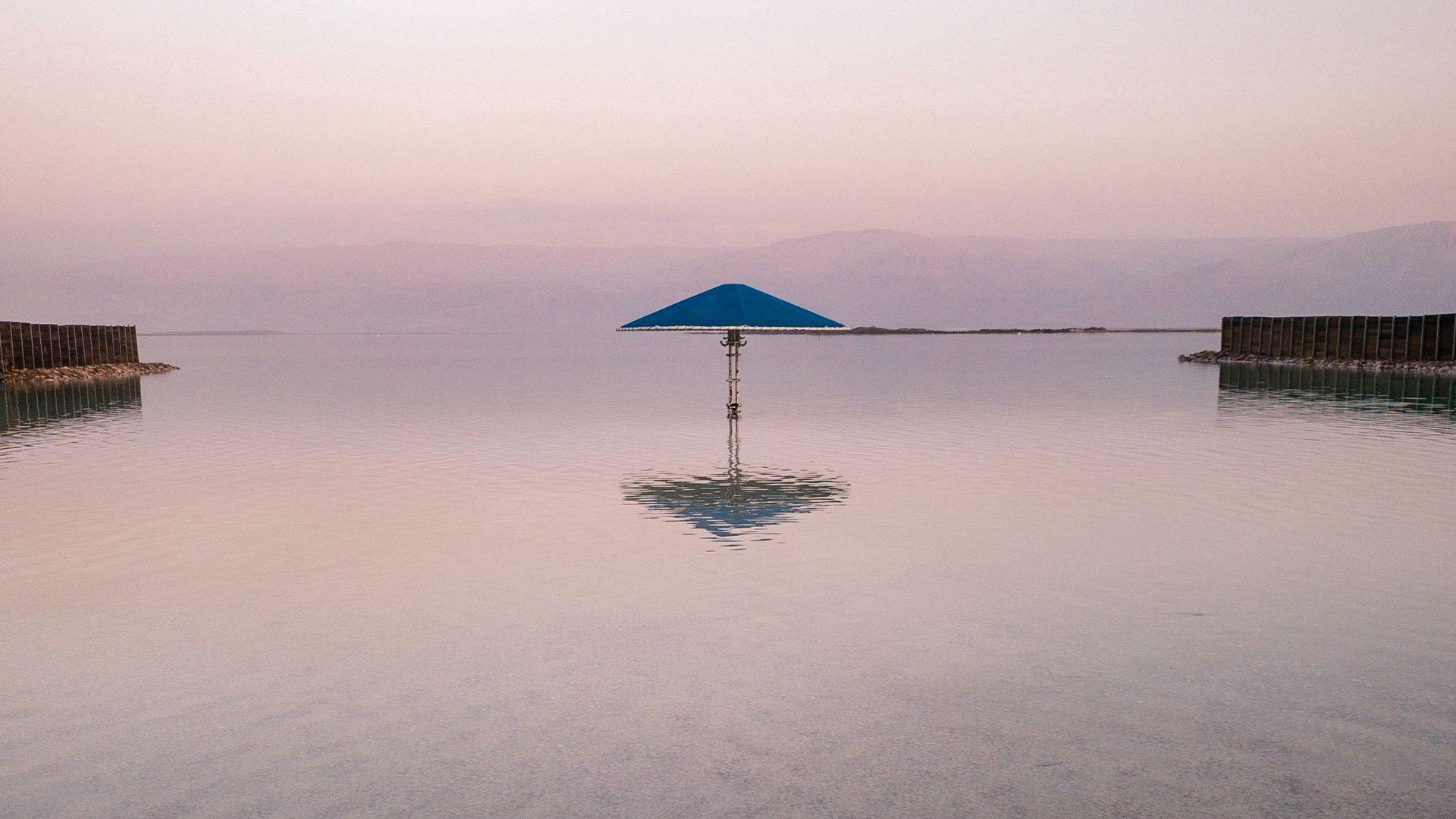 1920x1080 Download wallpaper 1920x1080 sea, beach, umbrella, water