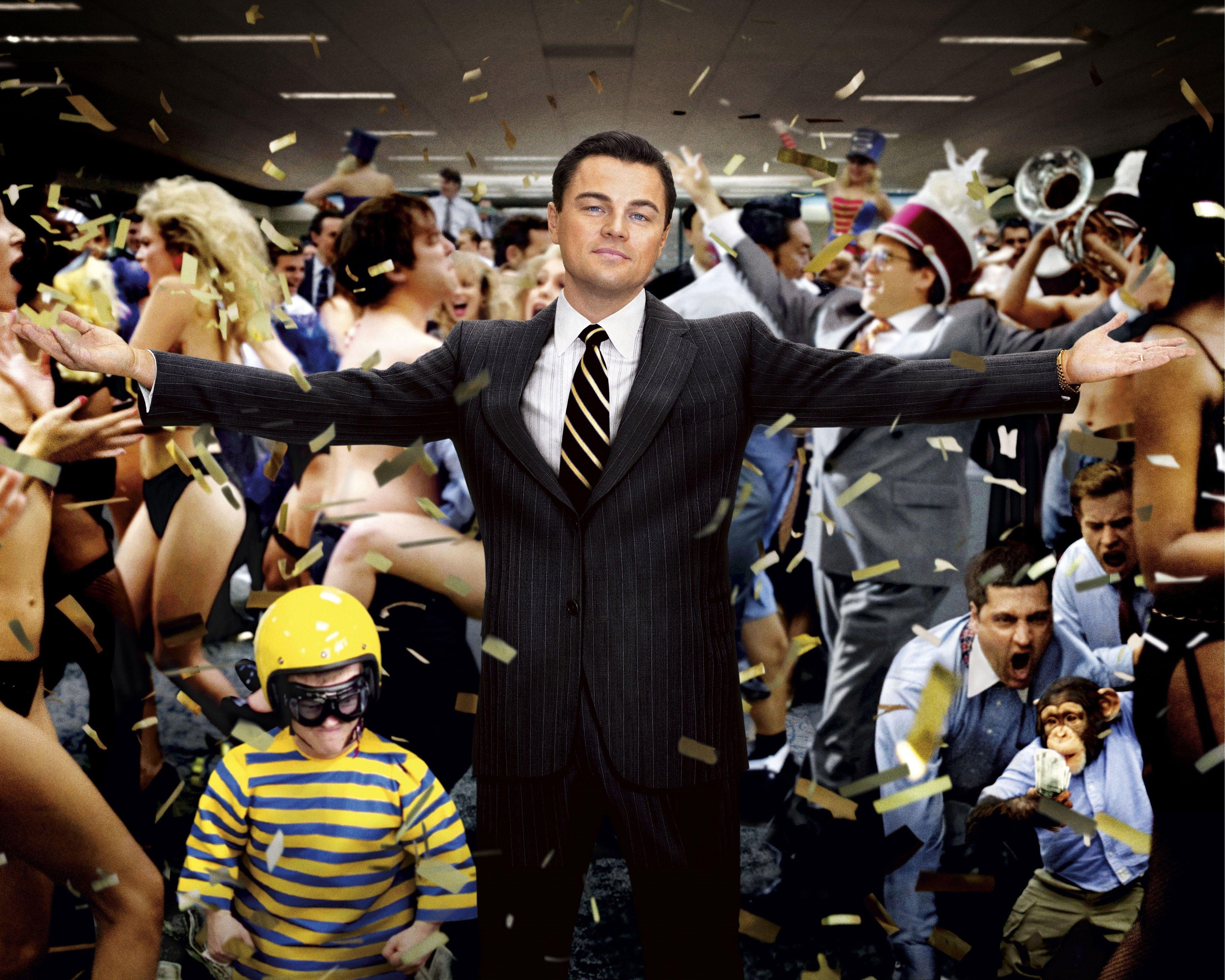 Download A charismatic Leonardo DiCaprio as Jordan Belfort in the classic  financial biographical drama The Wolf of Wall Street Wallpaper  Wallpapers com