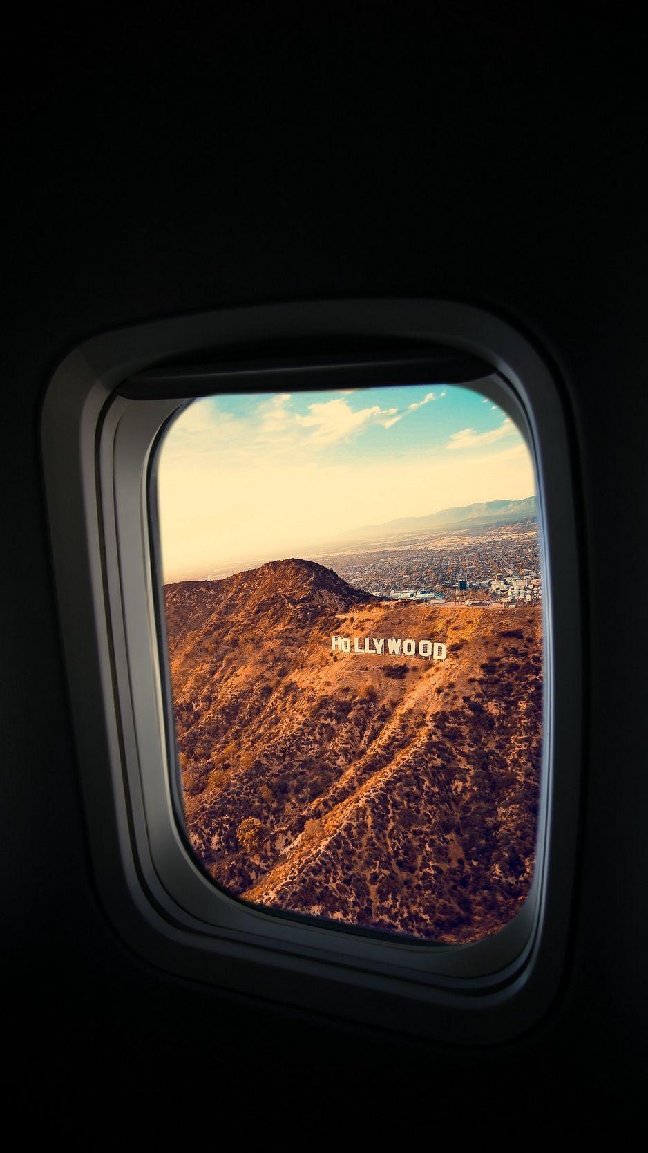 938x1668 Download wallpaper 938x1668 porthole, window, plane, flight