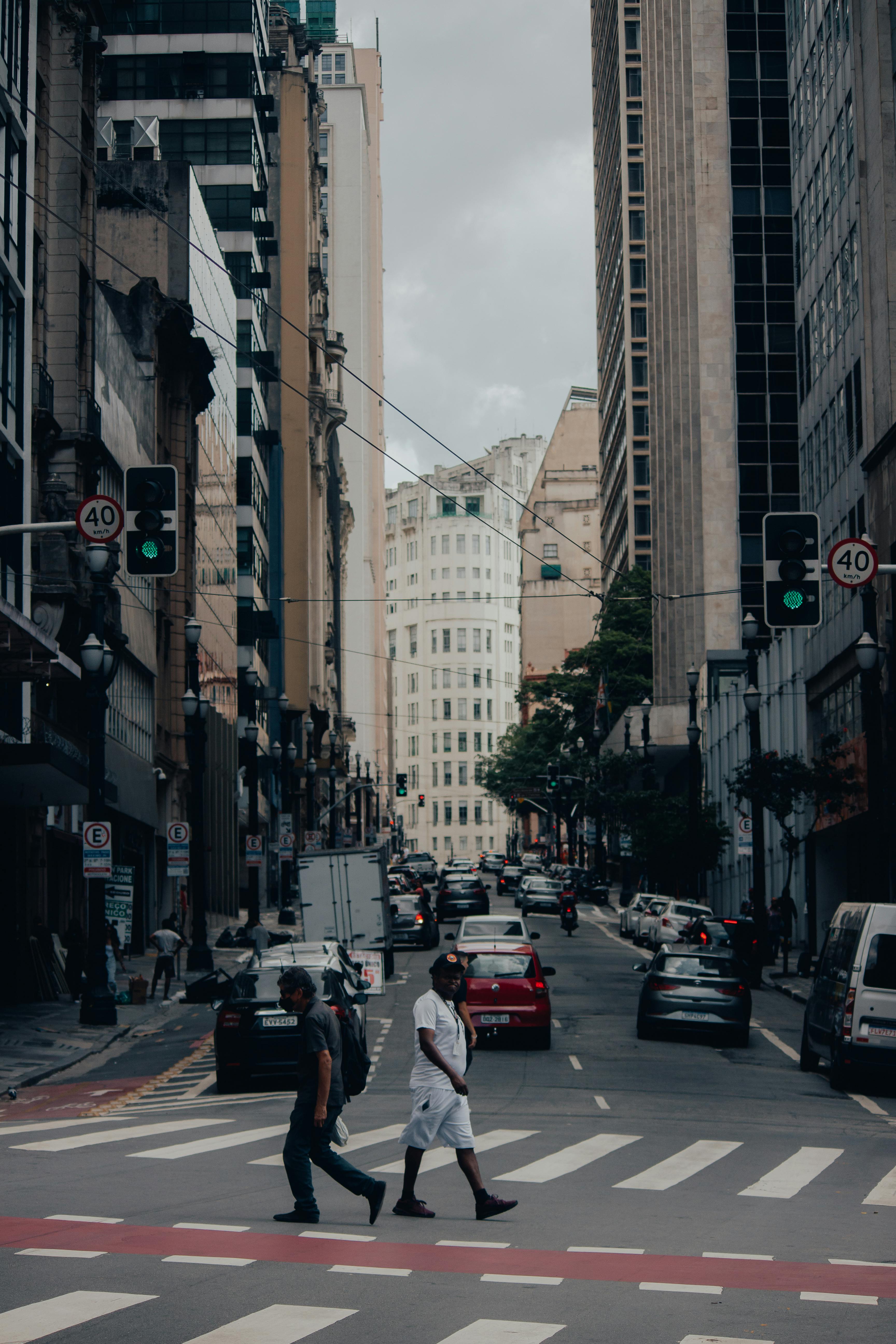 3456x5184 Photo of People Walking on a Pedestrian Lane · Free