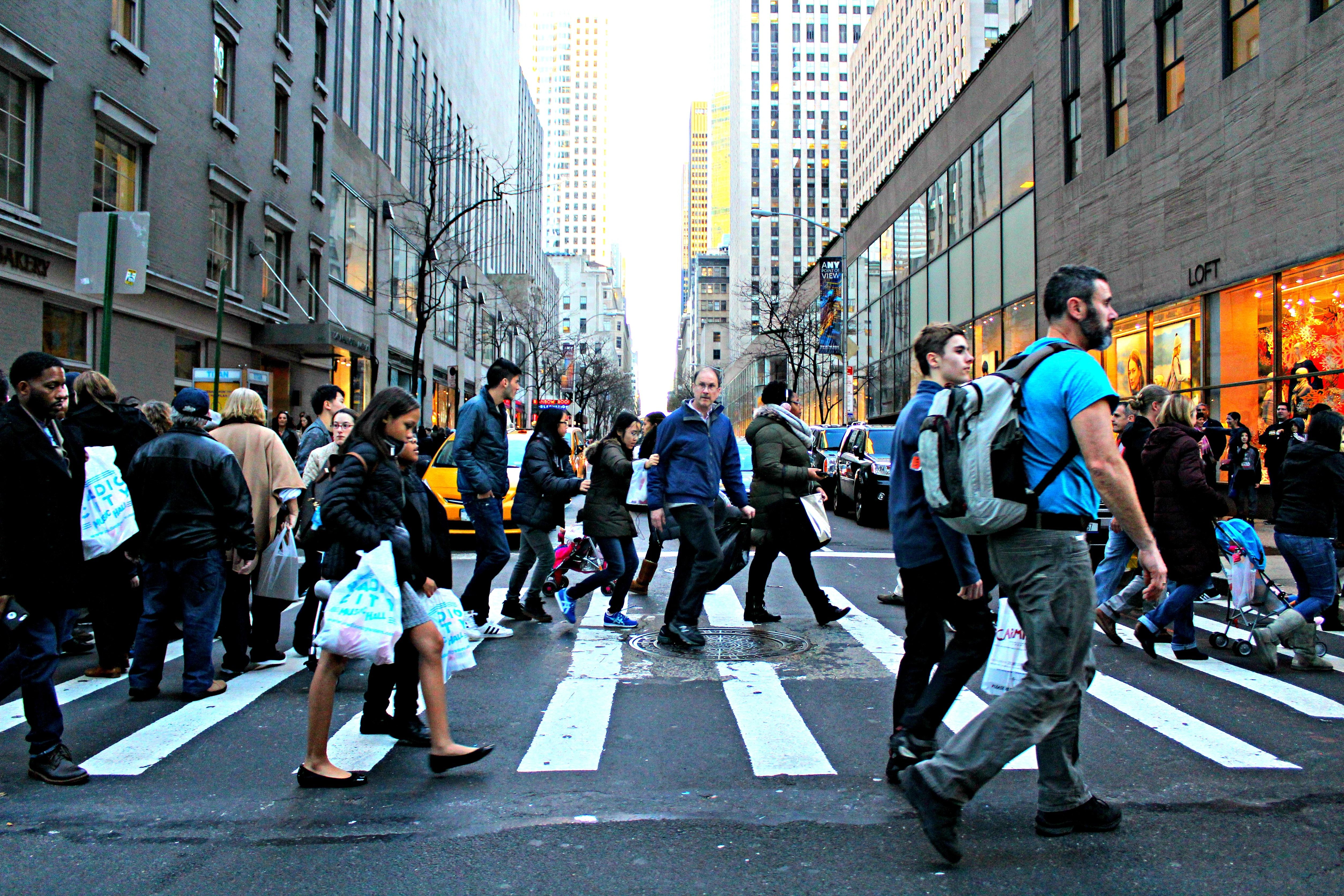 5016x3344 group of people crossing road on pedestrian lane at daytime free image