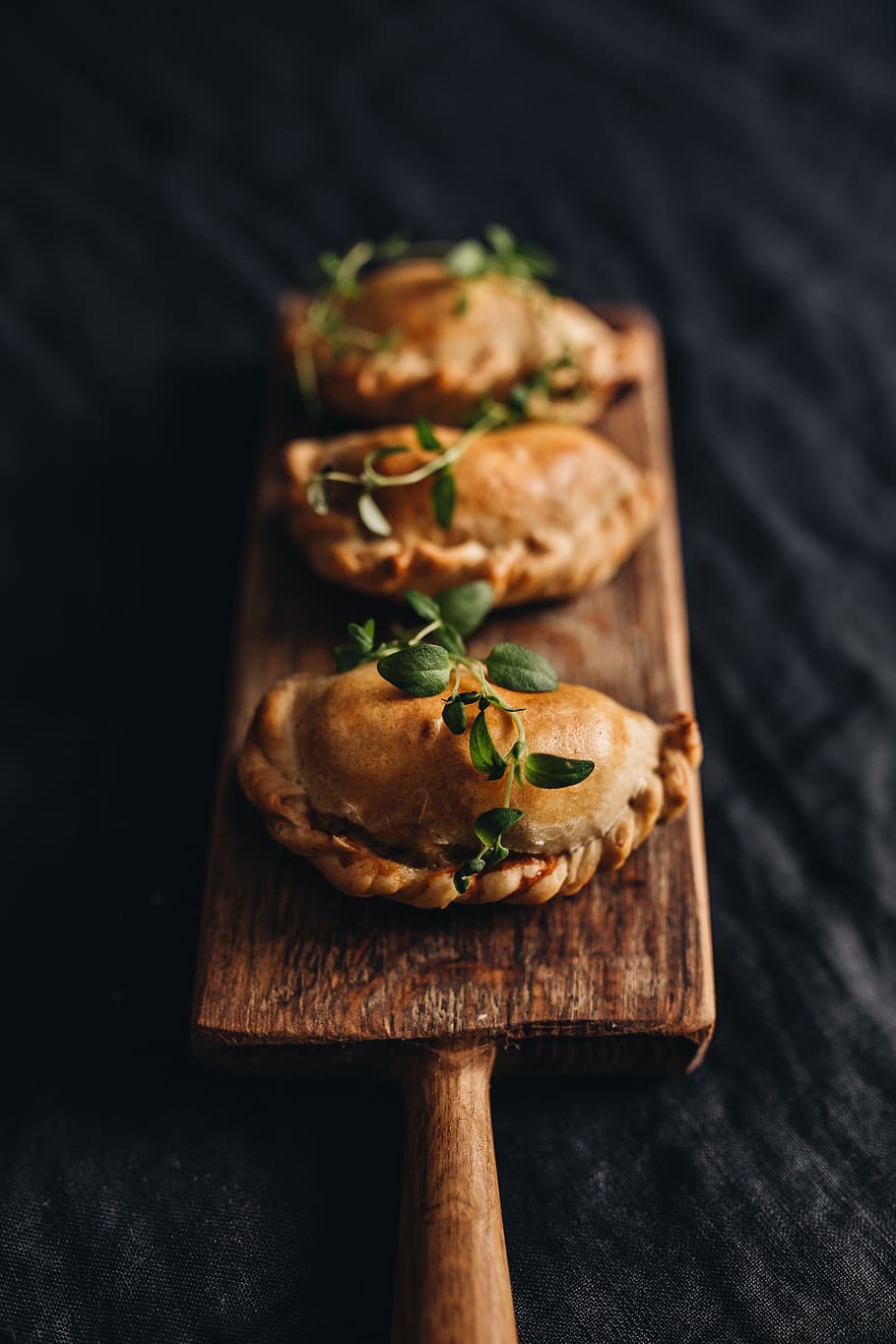 910x1365 HD wallpaper: Baked Pierogies, food, meal, vegetarian, vegan