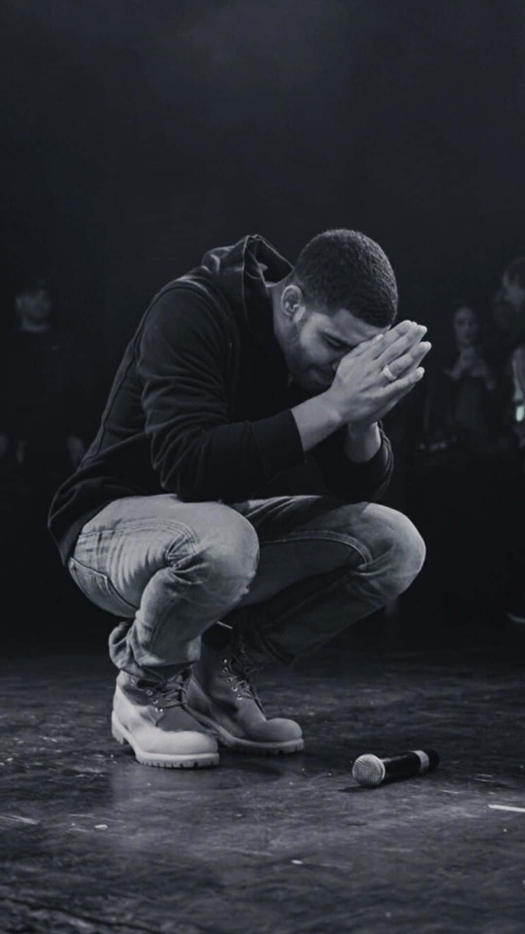 1080x1920 Download Feel the passion in the lyrics of Canadian rapper Drake Wallpaper