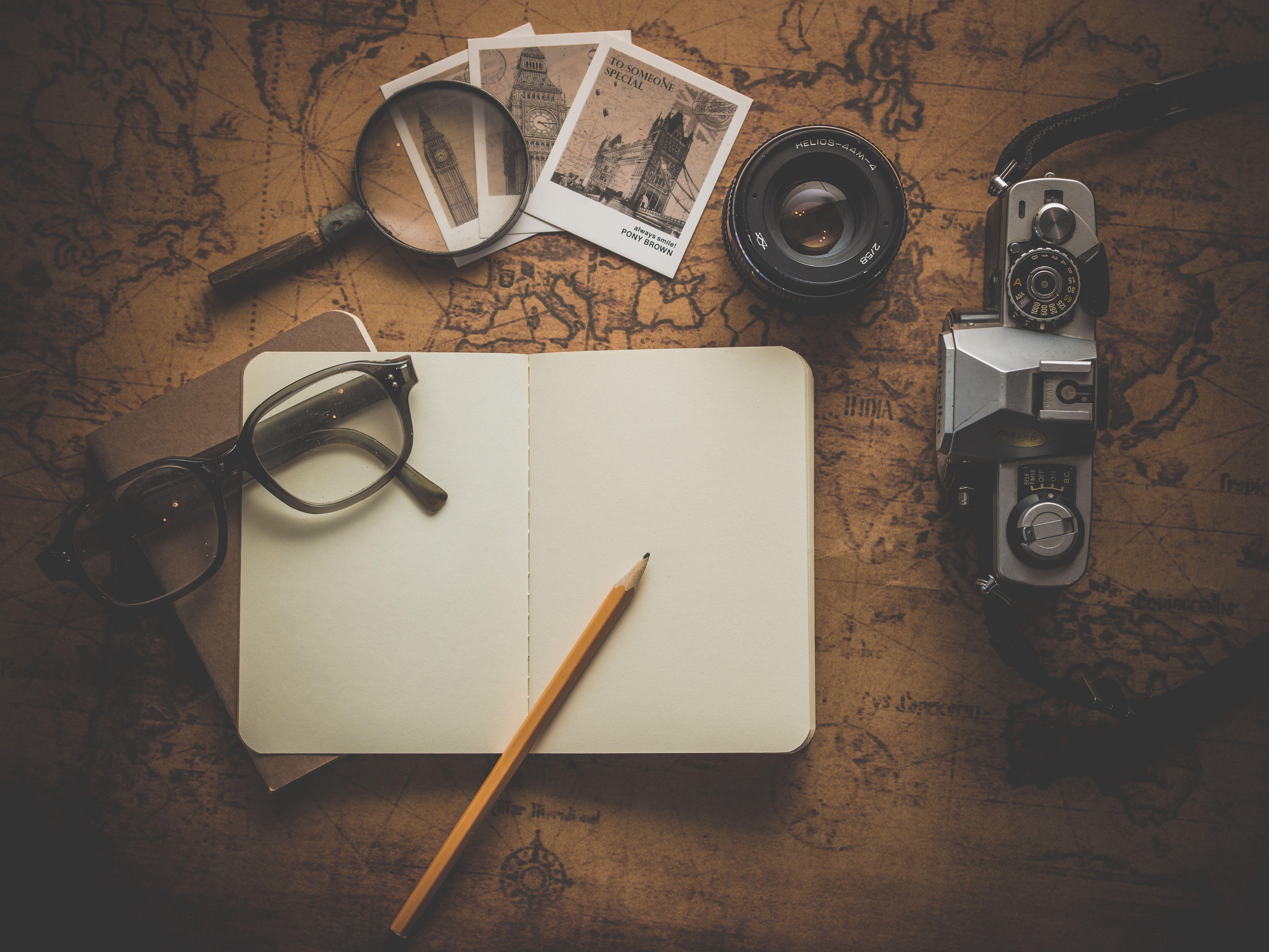 4608x3456 Silver Dslr Camera Beside Book · Free
