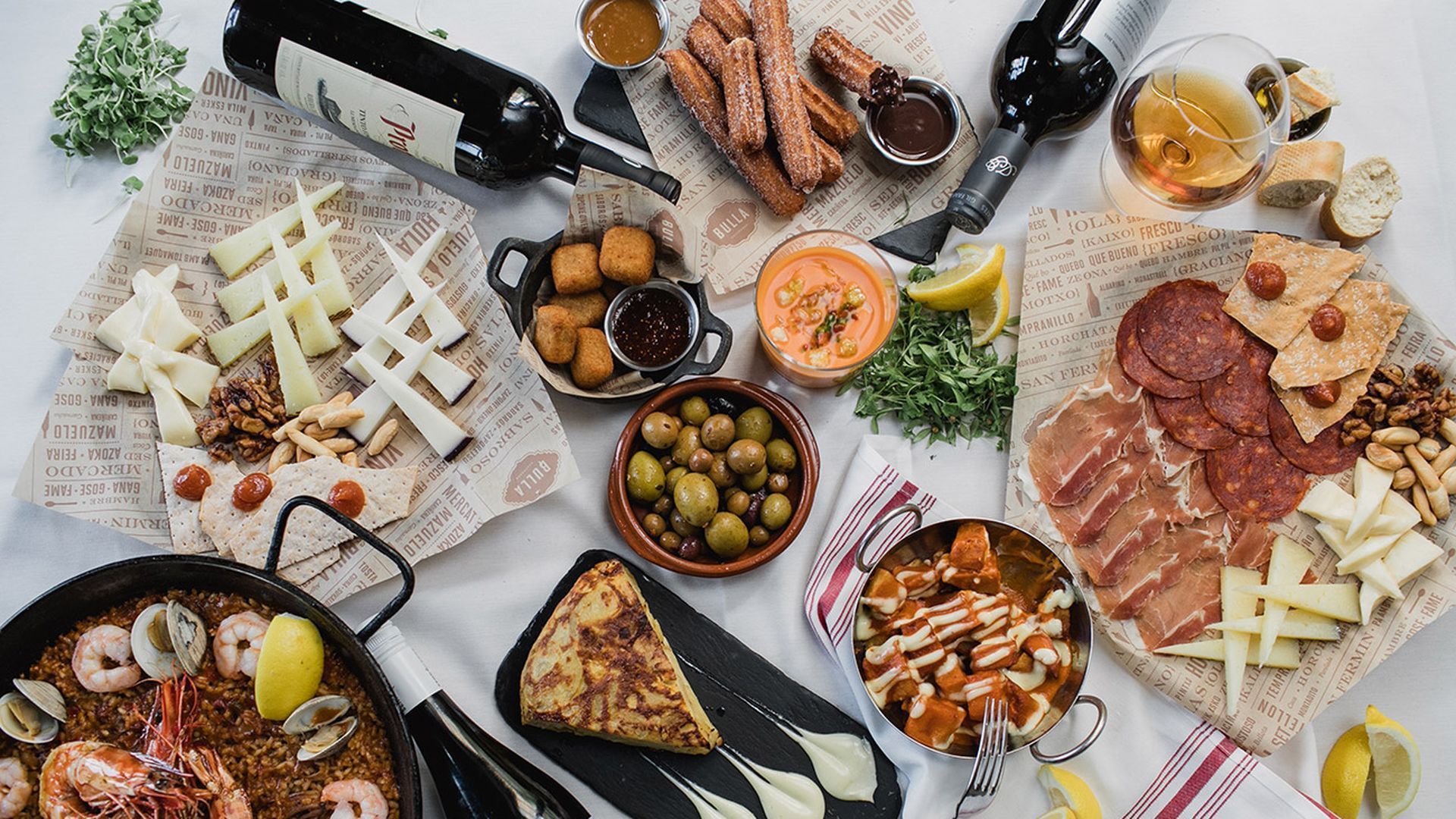1920x1080 Spanish tapas restaurant Bulla Gastrobar now open. View paella octopus, meatballs, ham and cheese balls and more dishes