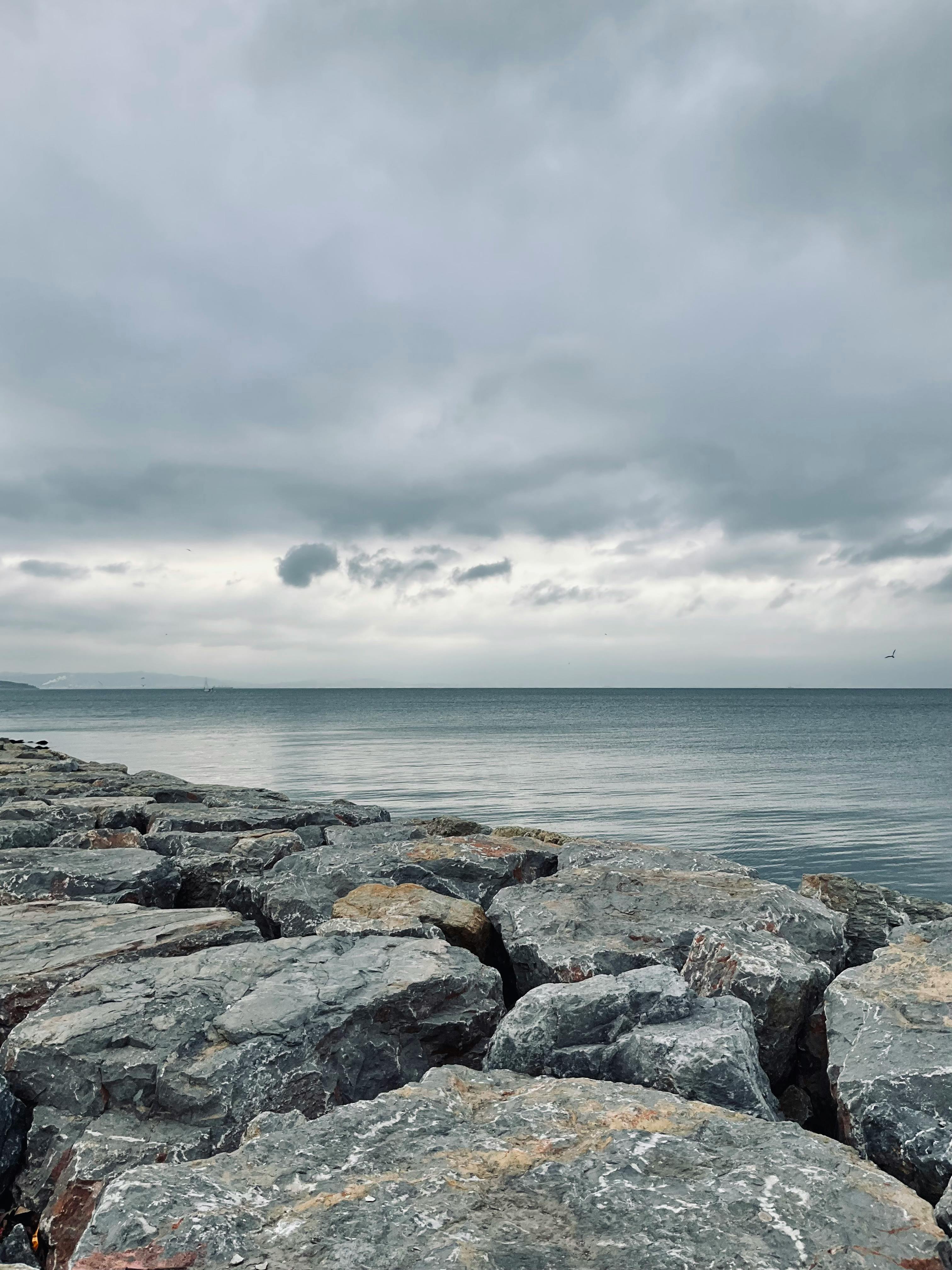 3024x4032 Gray Rocks near Ocean under the Sky · Free