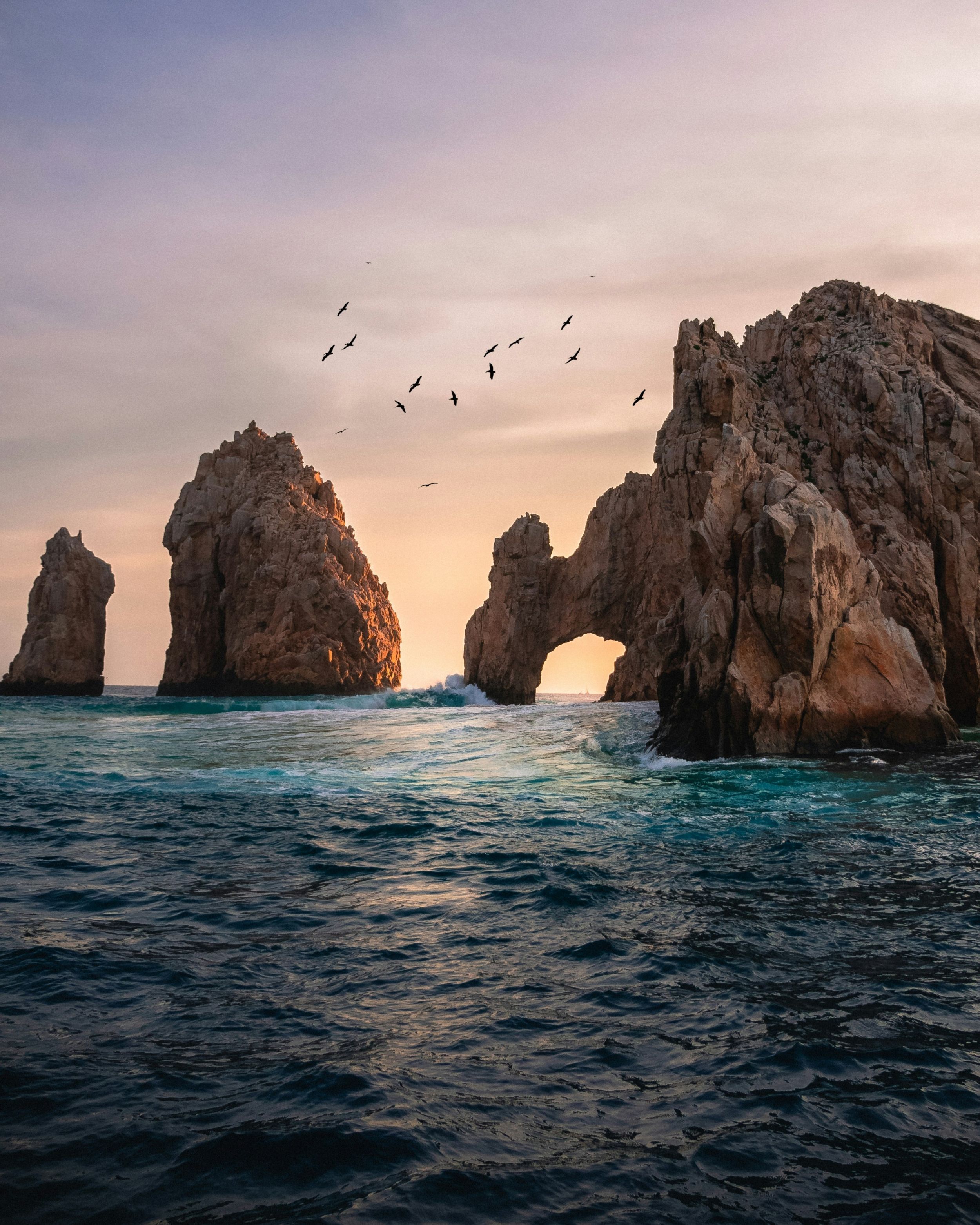 2500x3124 Birds Circle Around Three Big Rock Islands In The Ocean HD 4K