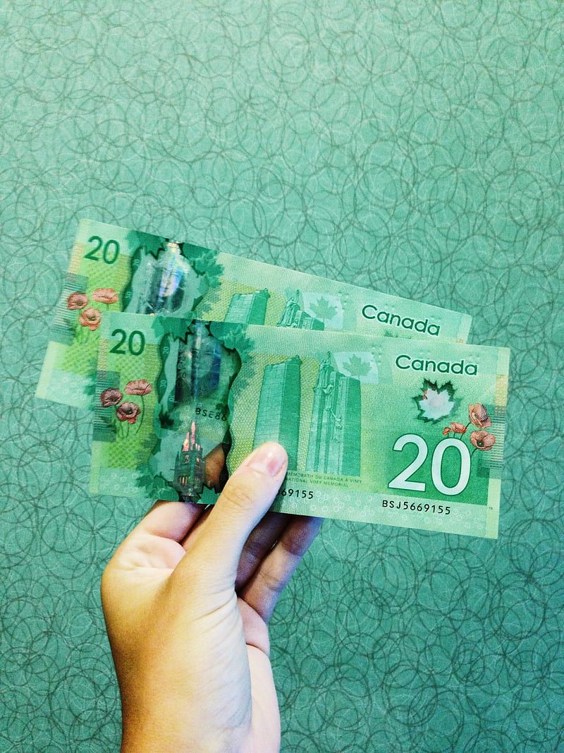 800x1067 Person holding two 20 Canadian dollar banknotes, HD phone wallpaper