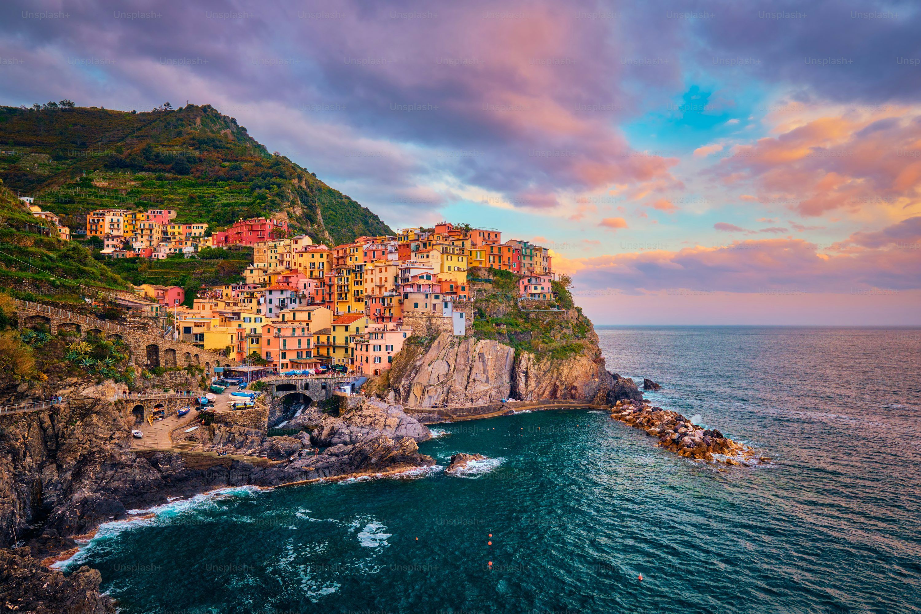 3000x2000 Manarola village popular european italian tourist destination in Cinque Terre National Park UNESCO World Heritage Site, Liguria, Italy on sunset photo
