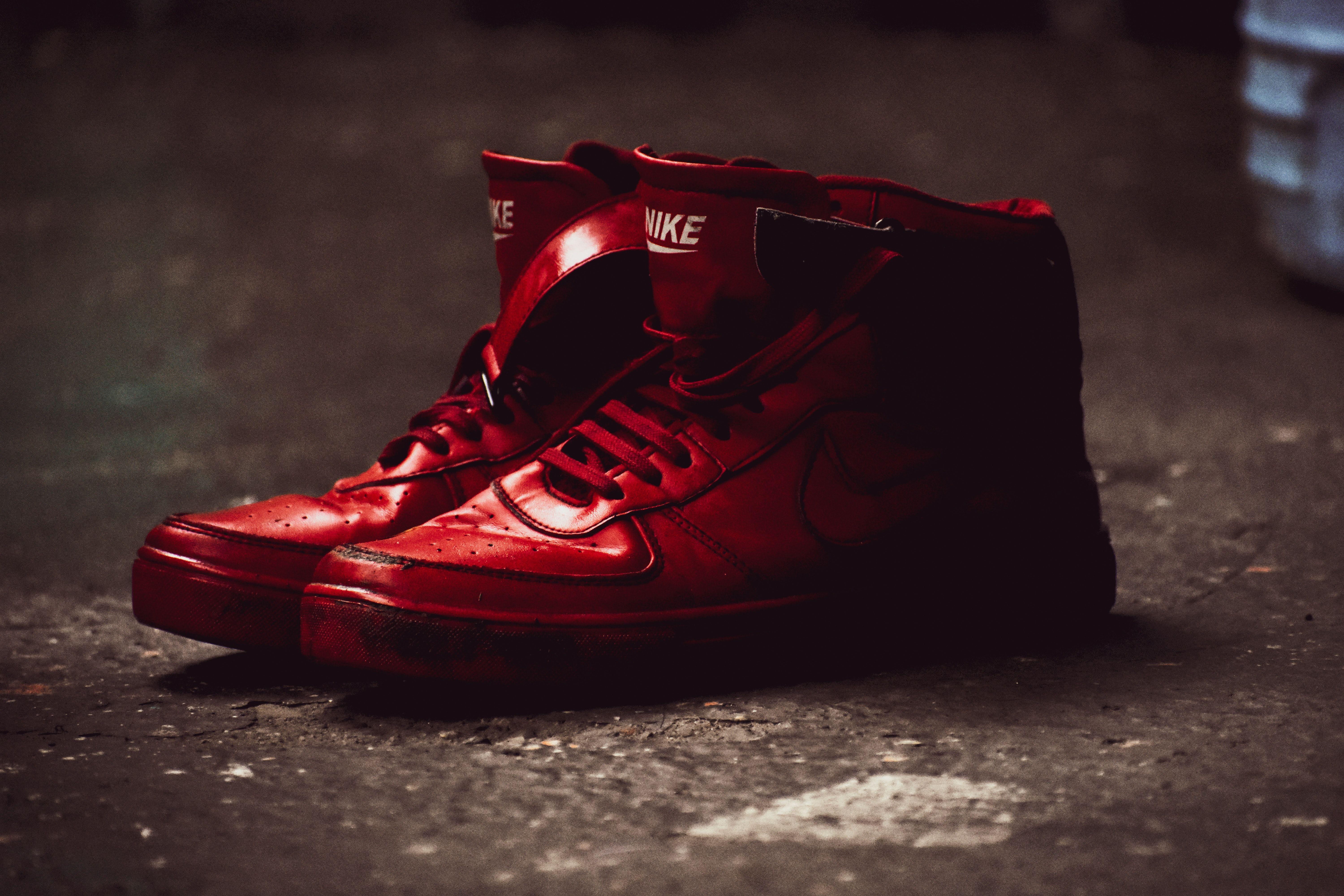 6000x4000 Close Up Photography of Red Nike Basketball Shoes · Free