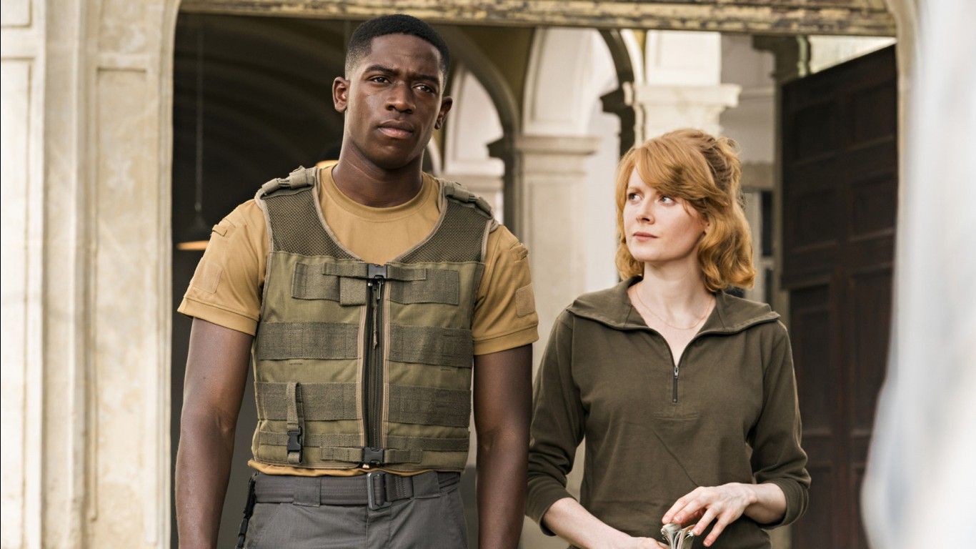 1366x768 Damson Idris Emily Beecham HD Outside the Wire Wallpaper