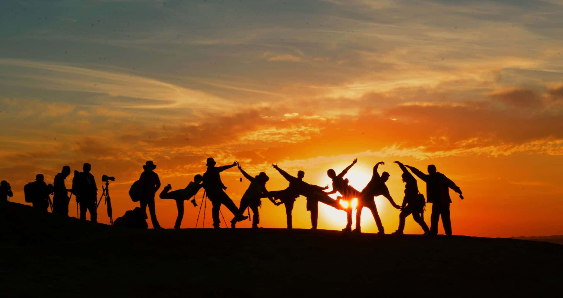 1920x1019 Download free Silhouette Of Group Of Friends During Sunset Wallpaper