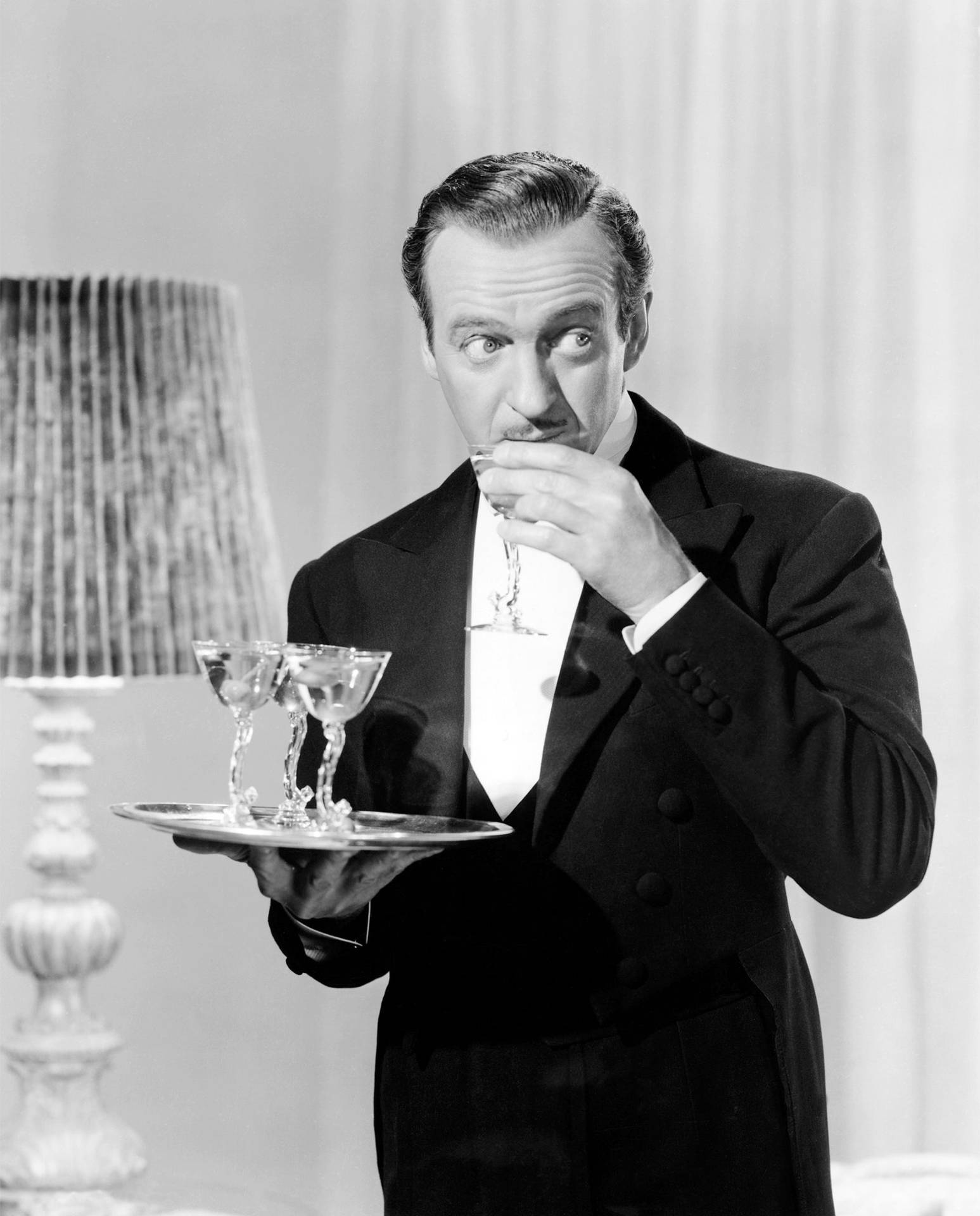 1547x1920 Download Classic Hollywood Star, David Niven, Enjoying Drinks Wallpaper