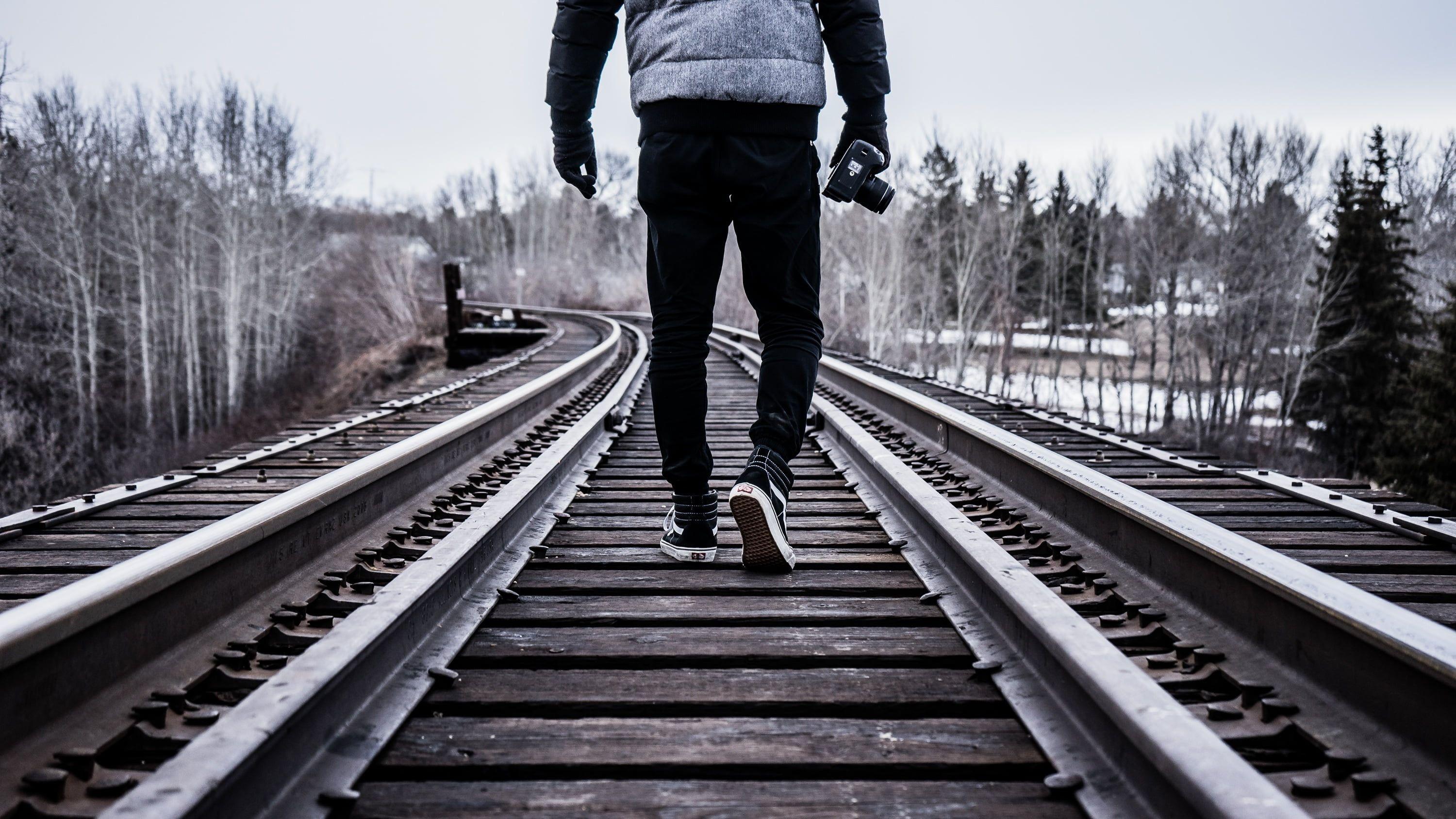 3000x1688 Persons walking on train railing HD wallpaper