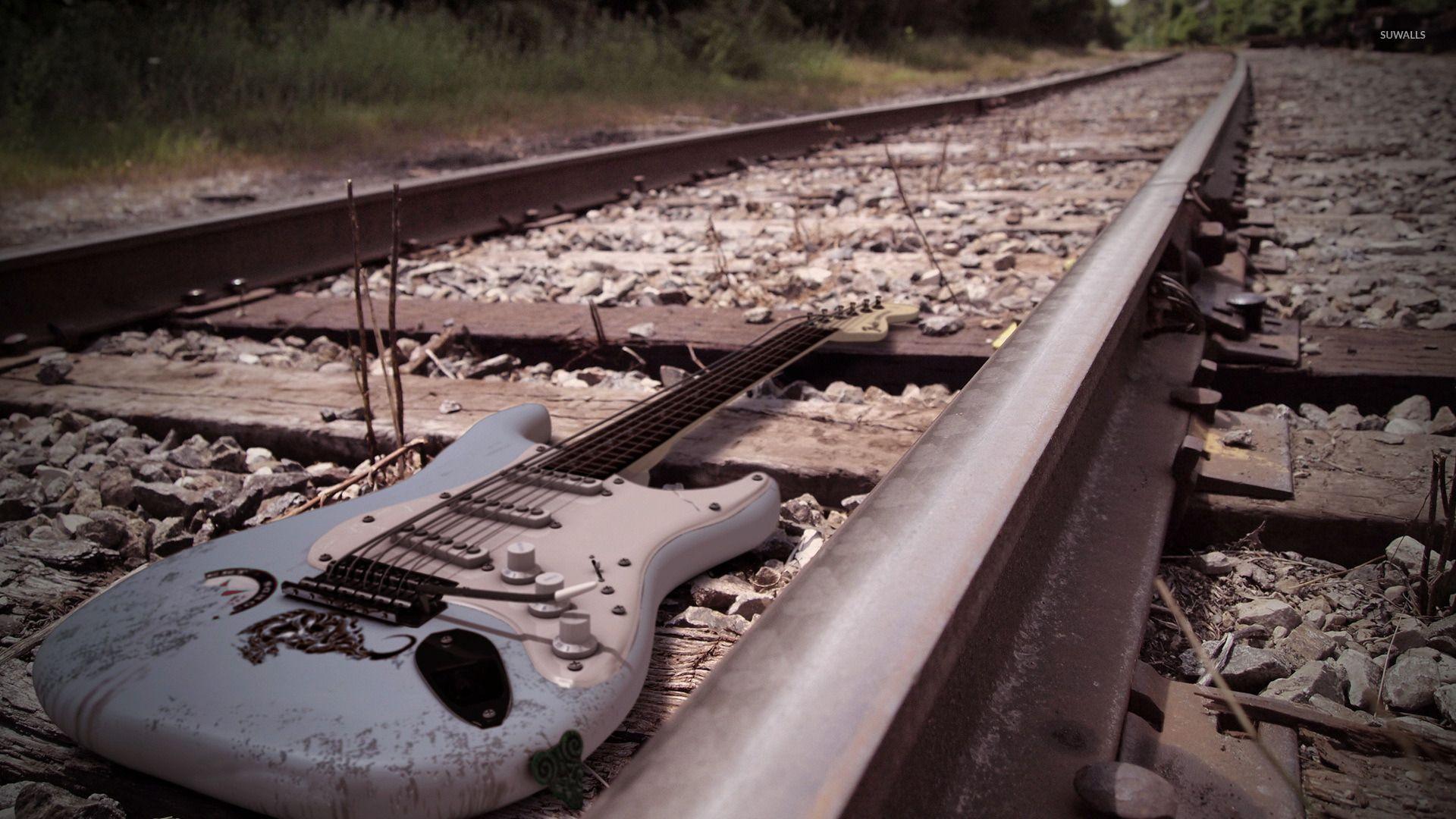 1920x1080 Guitar on the railroad wallpaper wallpaper