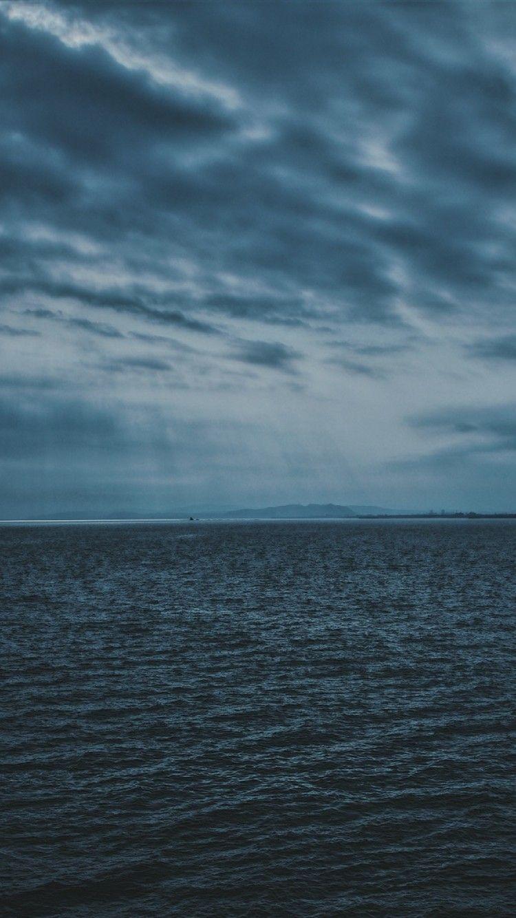 750x1334 Dark clouds over the sea HD Wallpaper iPhone 6 / 6S Wallpaper