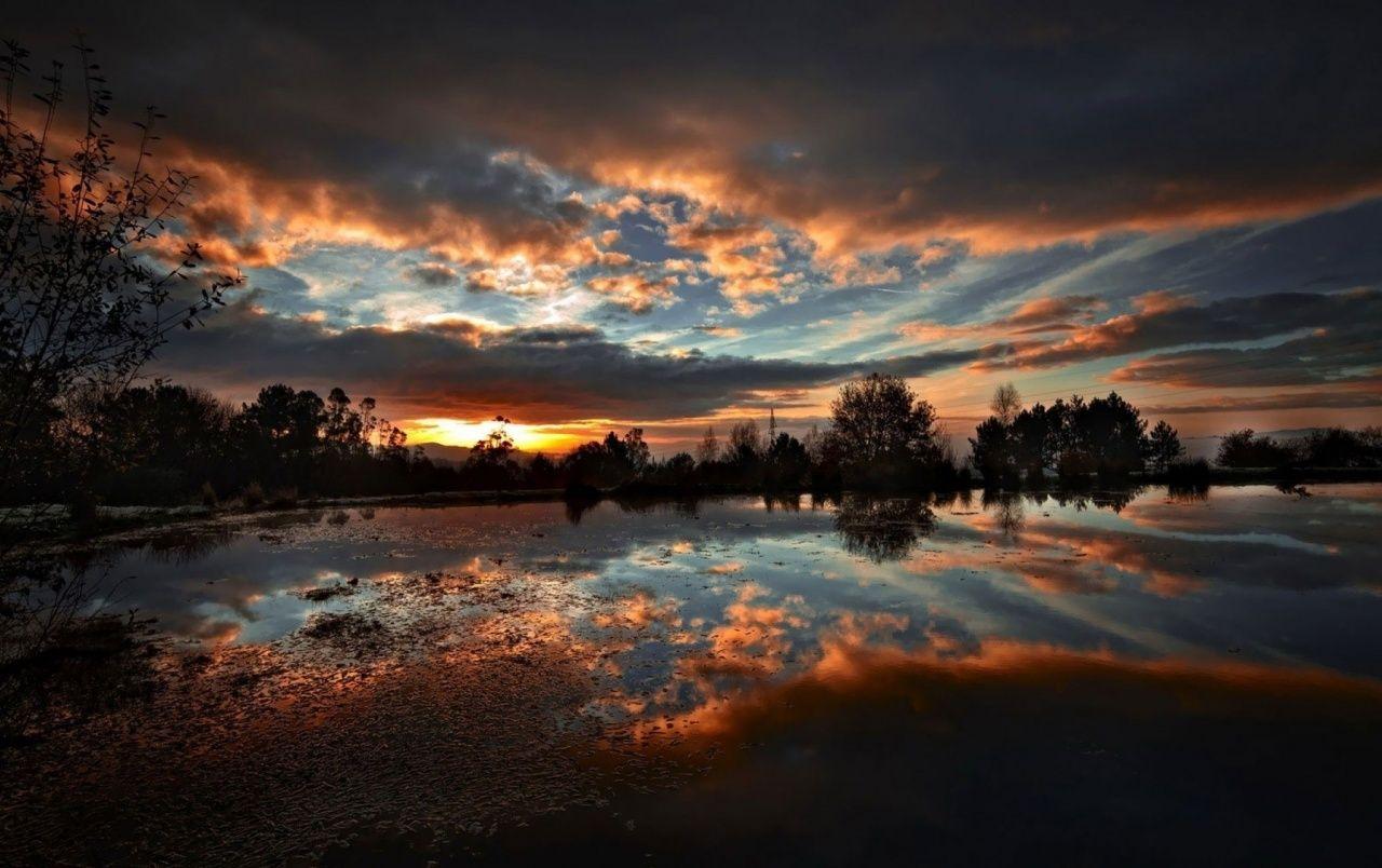 1280x804 Dark Clouds Sunset Lake Trees wallpaper. Dark Clouds Sunset Lake