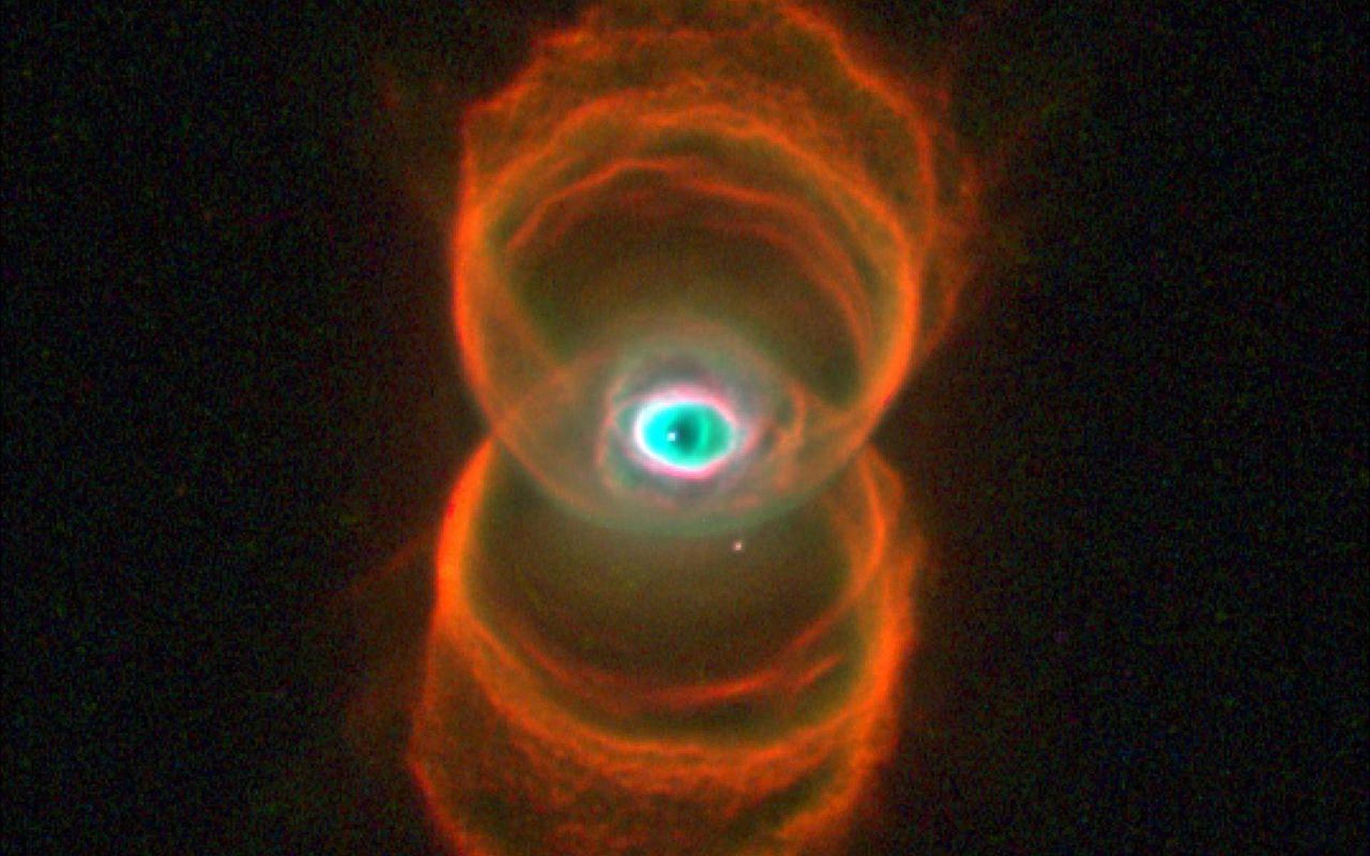 1920x1200 Space Image. Hubble Finds an Hourglass Nebula around a Dying Star