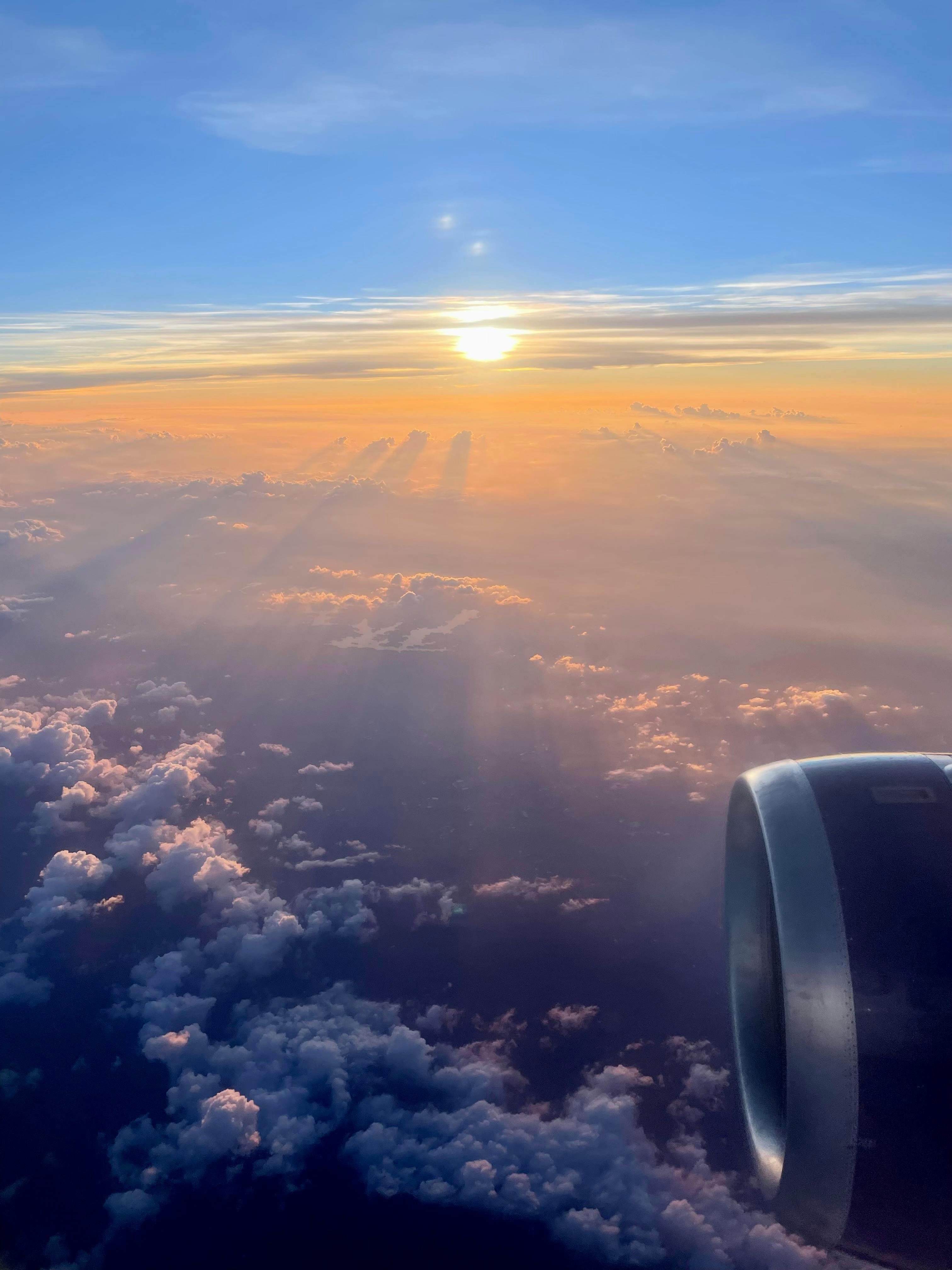 3024x4032 Sunset in Sky near Plane Turbine · Free