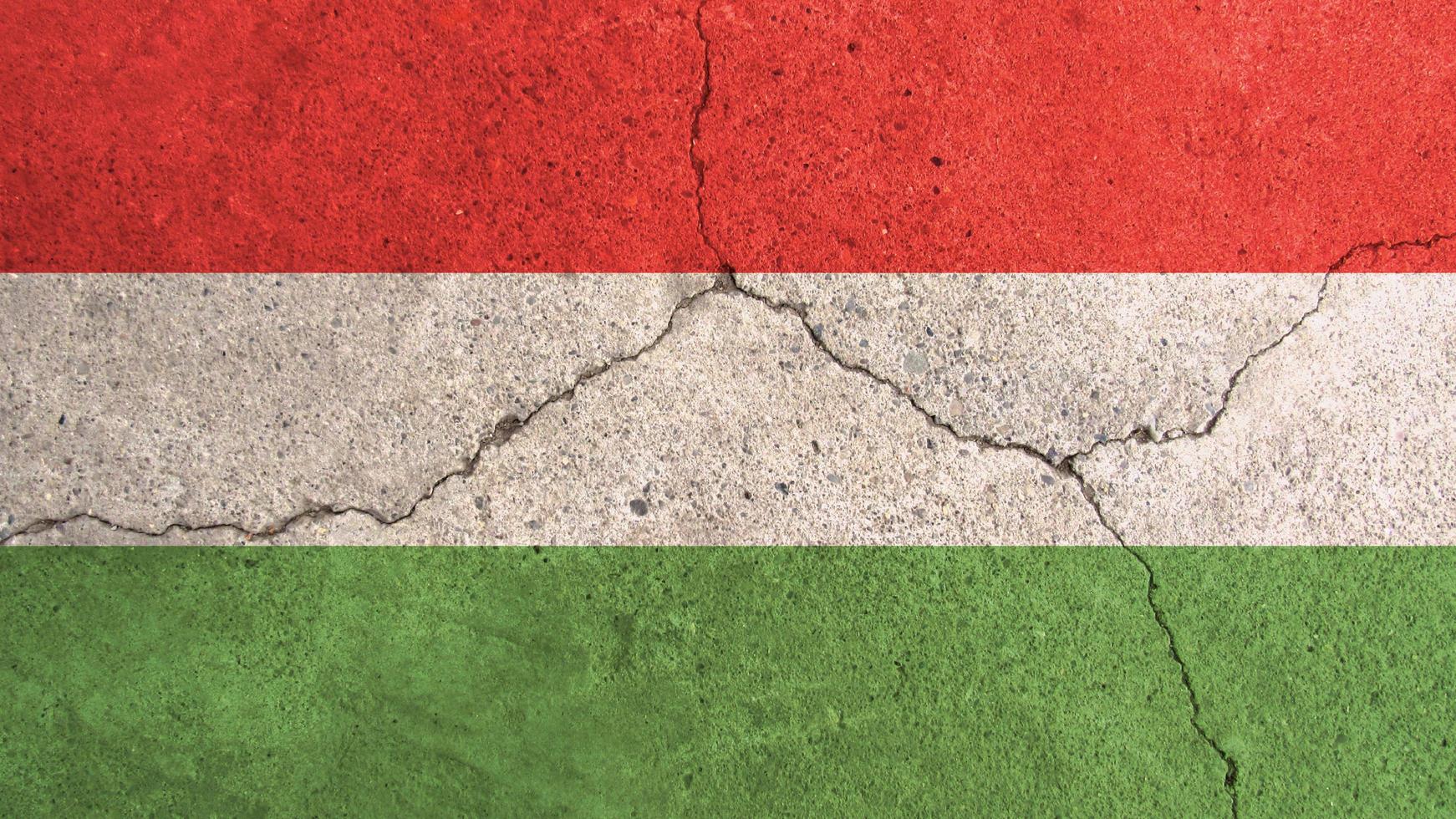 1742x980 Hungary flag. Hungary flag on cracked cement wall