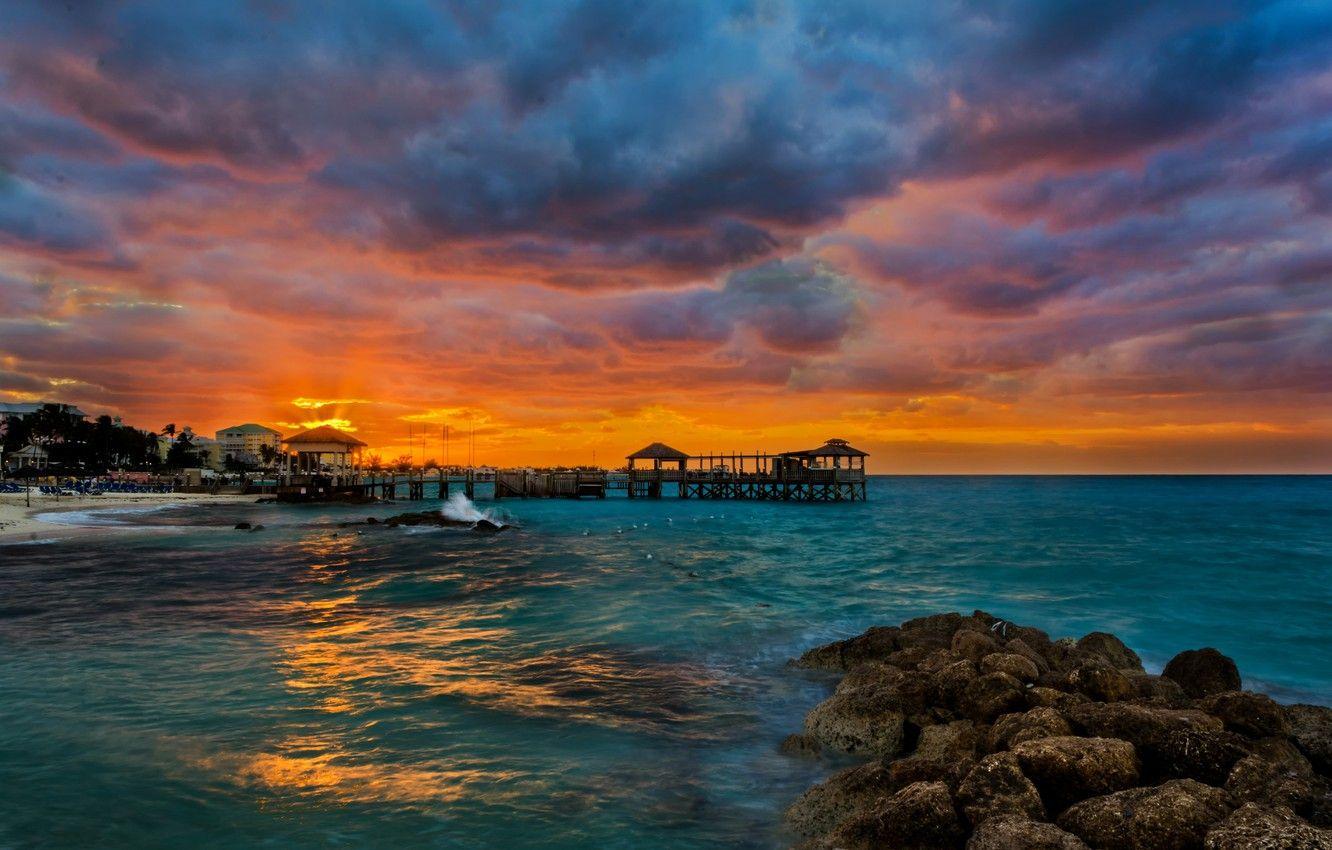 1332x850 Wallpaper sea, beach, tropics, stones, dawn, pier, Bahamas, Nassau