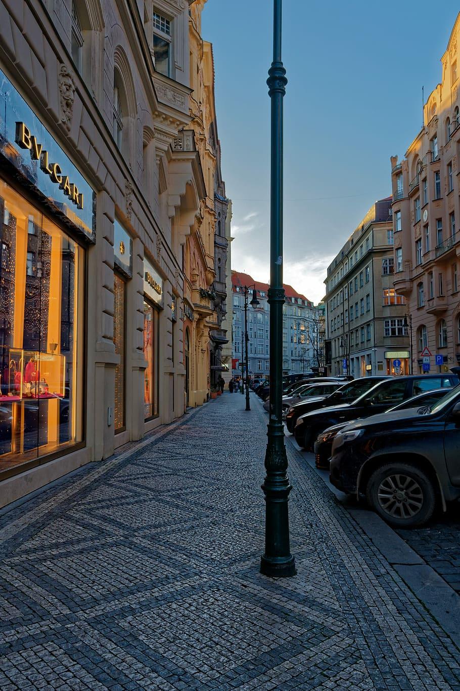 910x1365 HD wallpaper: prague, street, bvlgari, cars, column, building