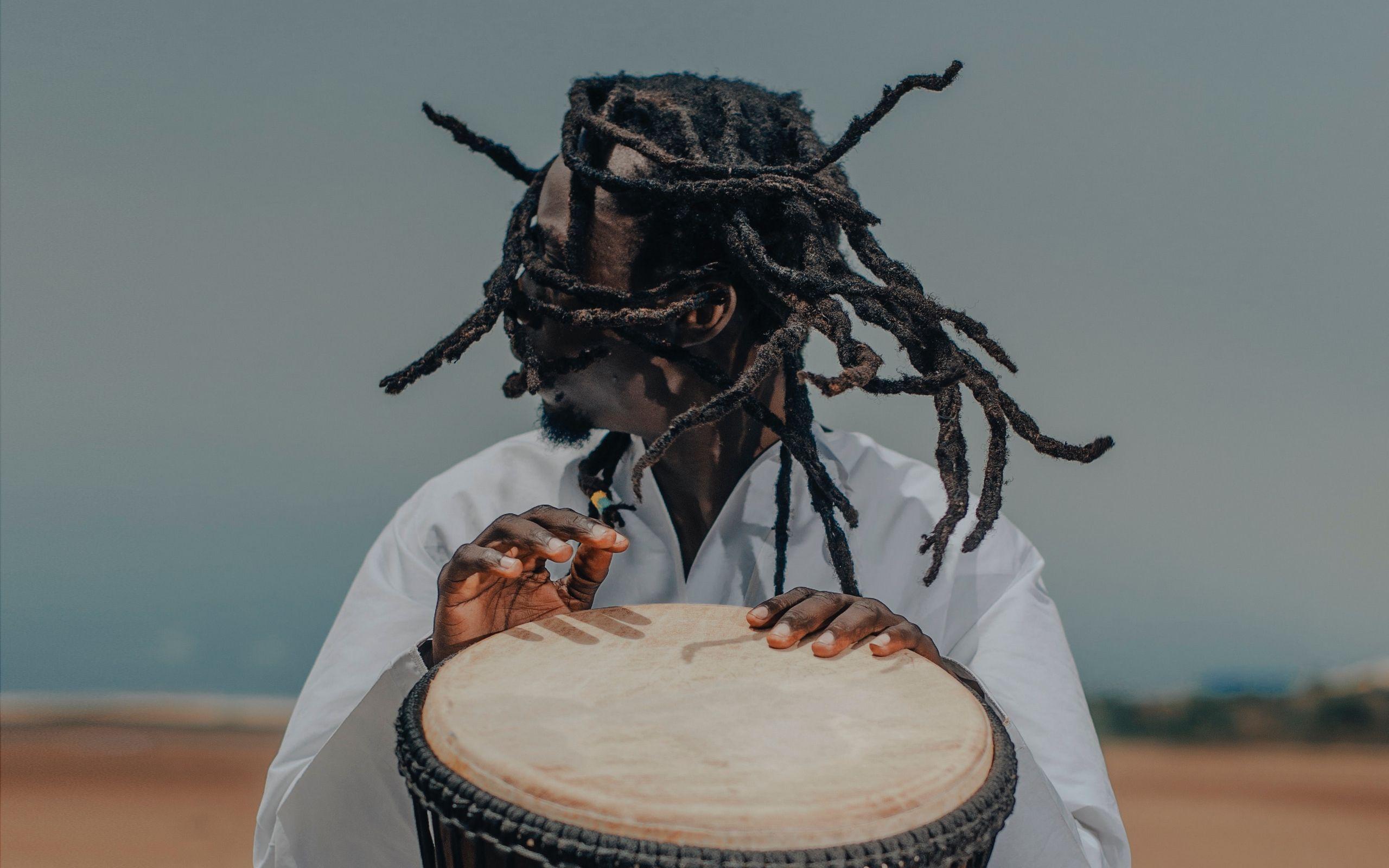 2560x1600 Download wallpaper 2560x1600 man, drum, drummer, musician, music