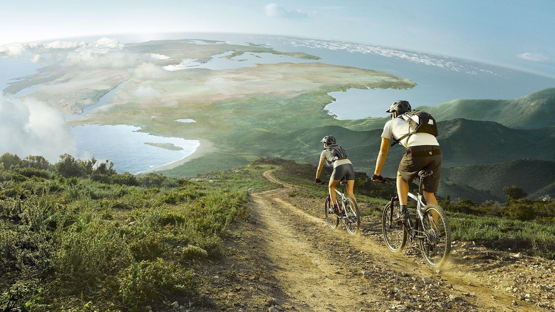 1920x1080 Mountain biking couple wallpaper