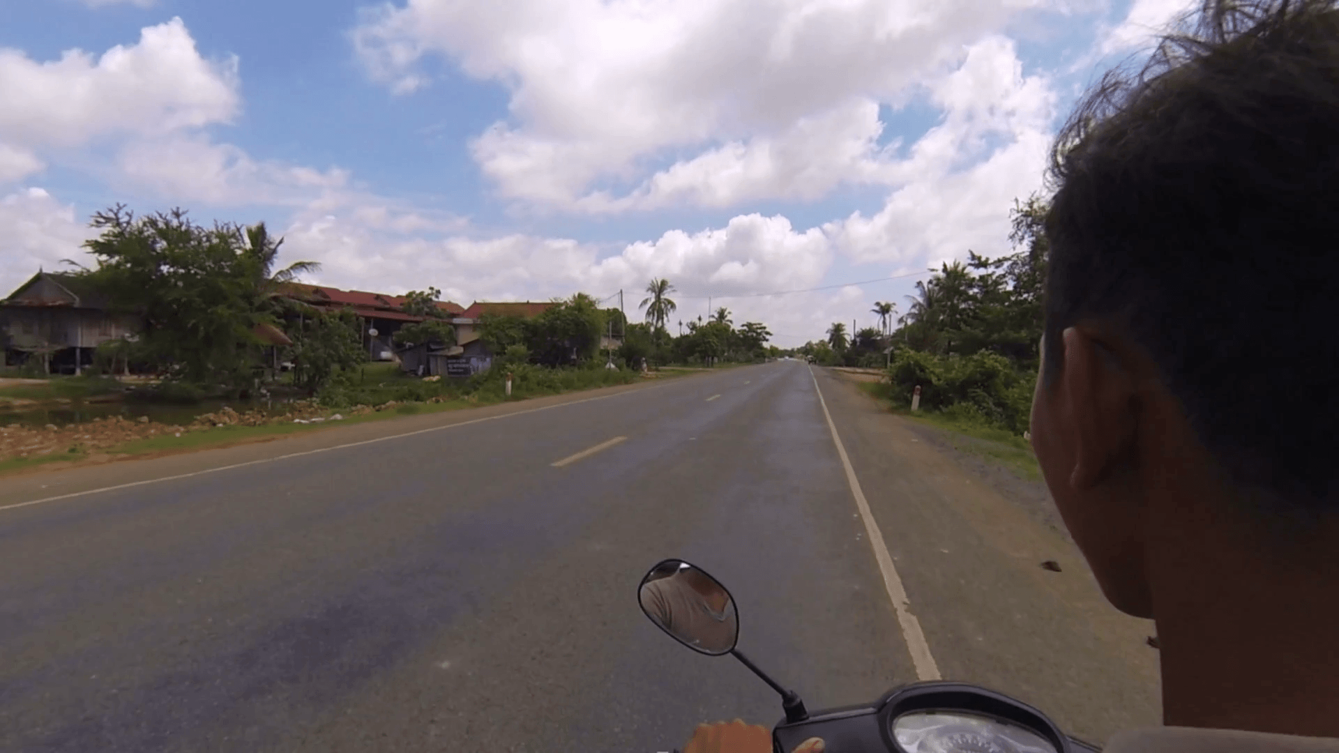 1920x1080 Driving a scooter in the Cambodian countryside Stock Video Footage