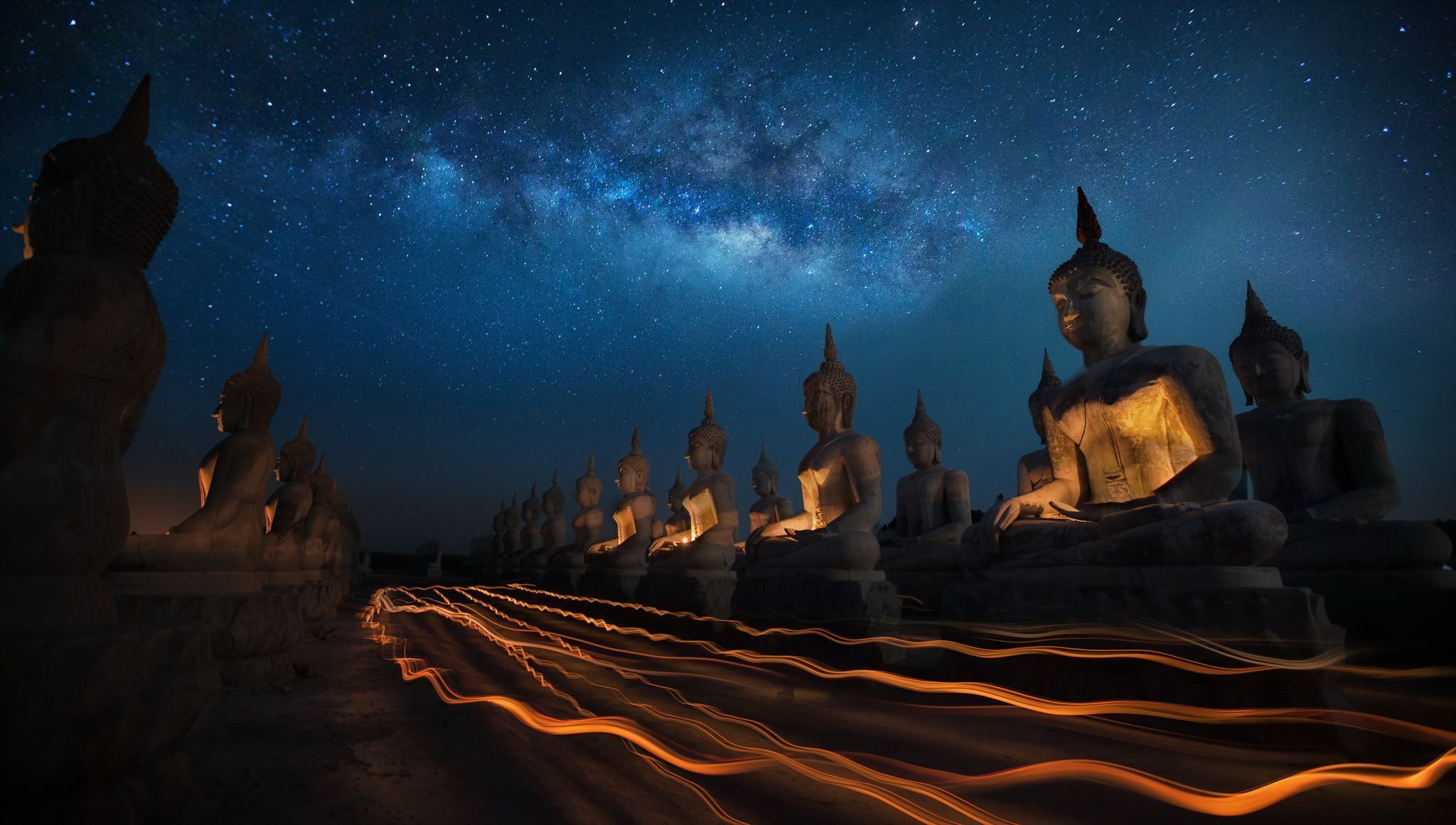 2048x1161 Milky Way Over Thai Buddha Statues: A Spiritual Nighttime Time Lapse HD Wallpaper By Anek Suwannaphoom
